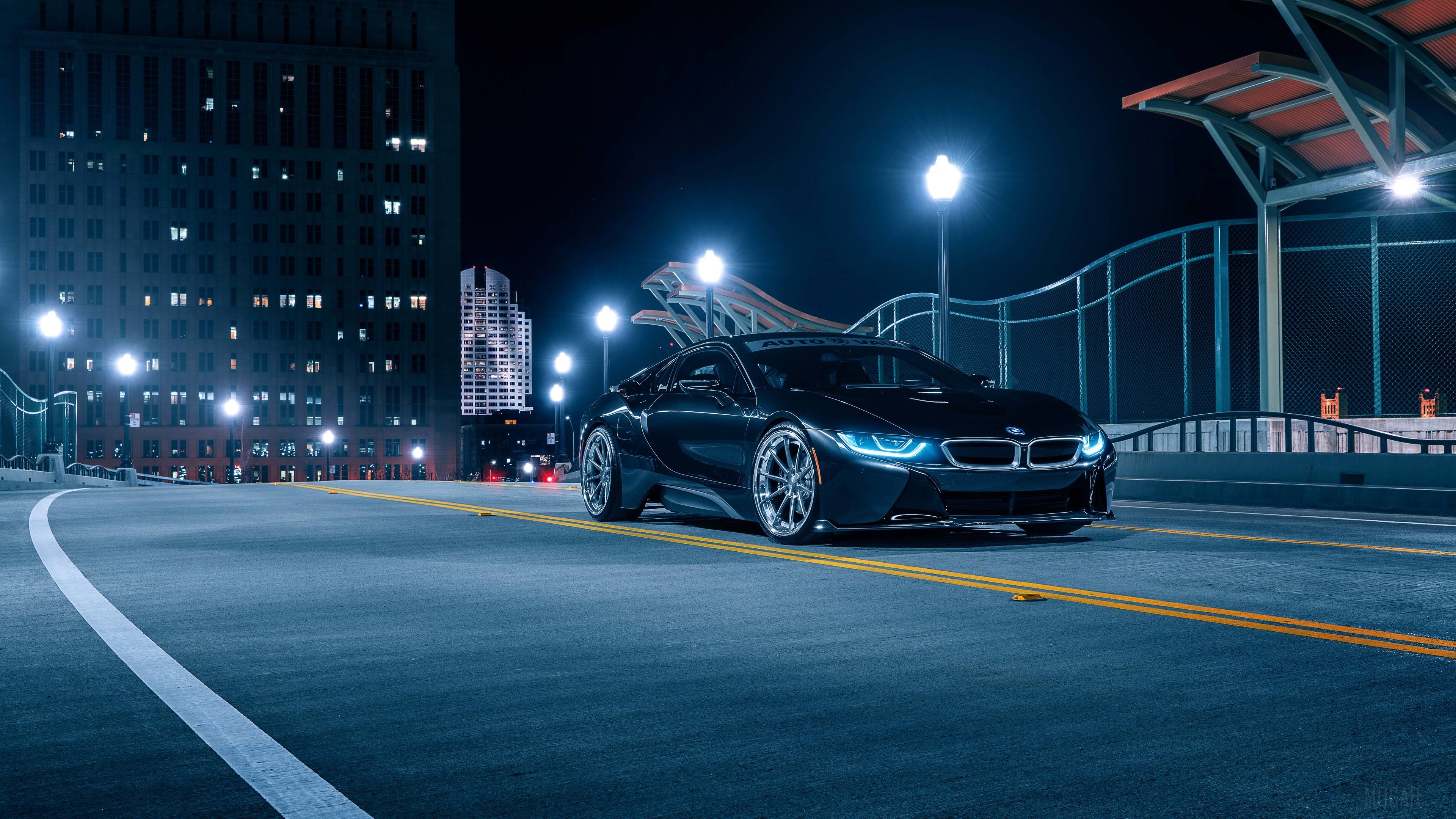 Black BMW i8 on a city bridge at night 4K HD Wallpaper