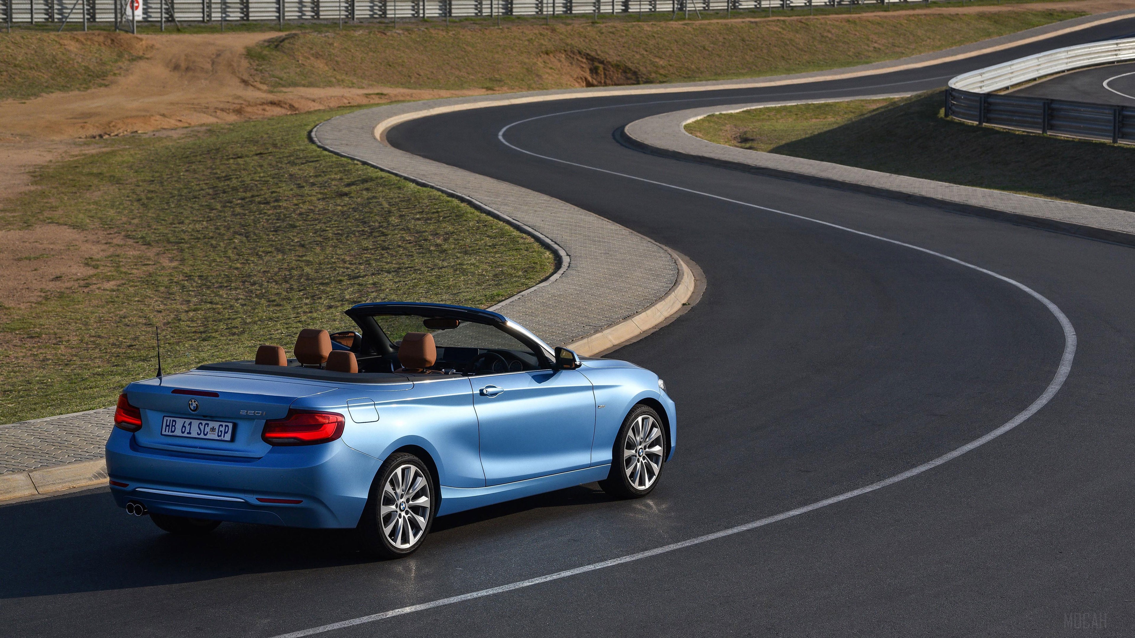Blue BMW 220i Cabrio Luxury Line on a Race Track 4K HD Wallpaper