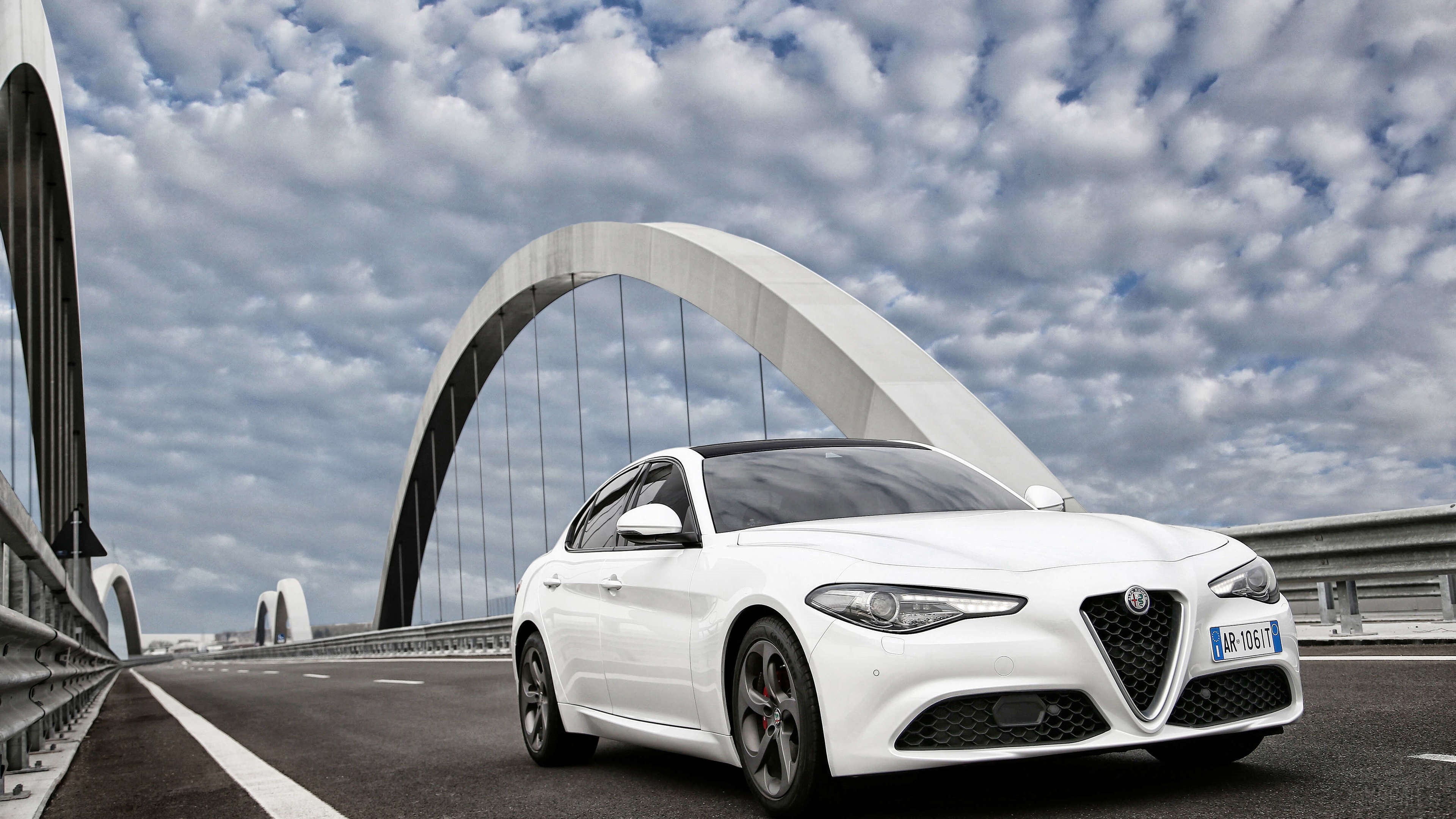White Alfa Romeo Giulia 2016 4K on a bridge HD Wallpaper