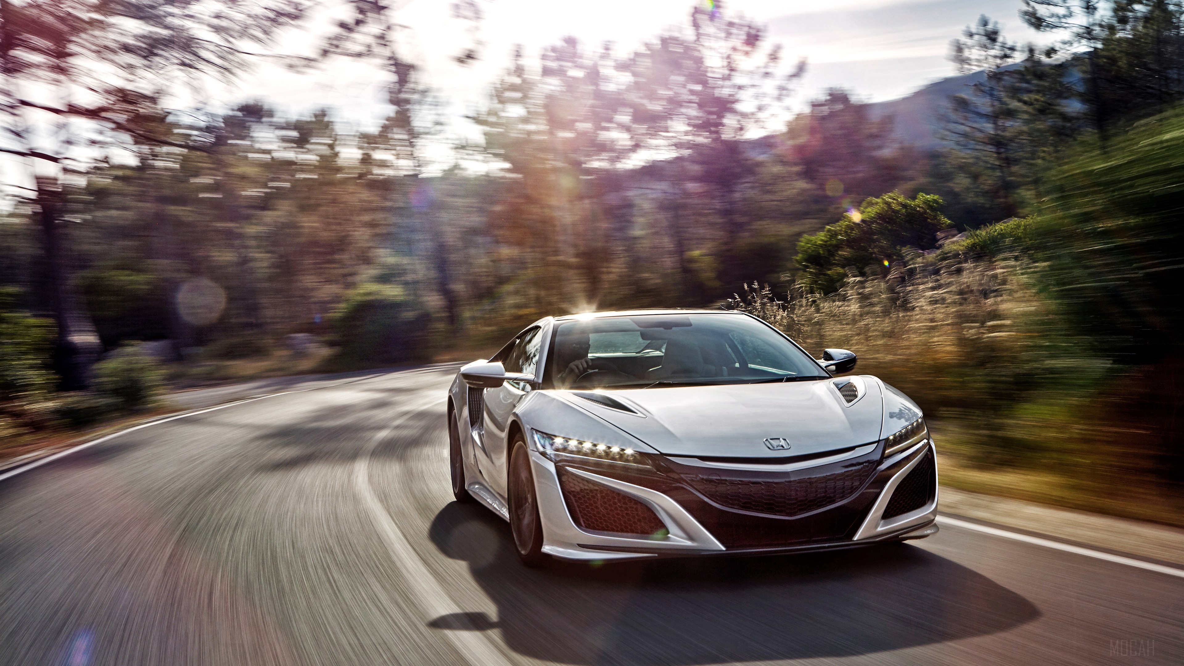 2017 Acura NSX driving on a winding road HD Wallpaper