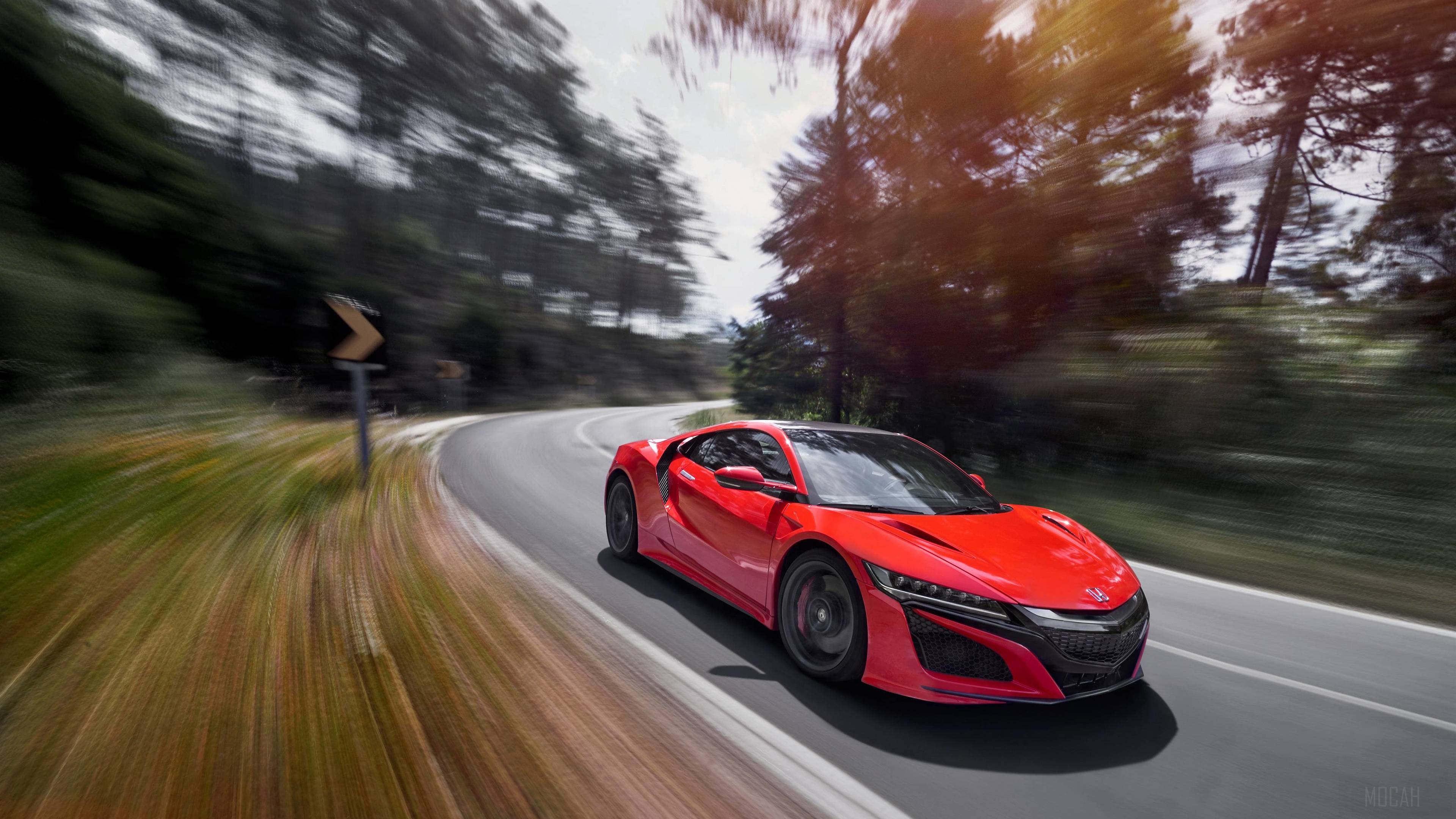 Red Honda NSX driving on a winding road HD Wallpaper