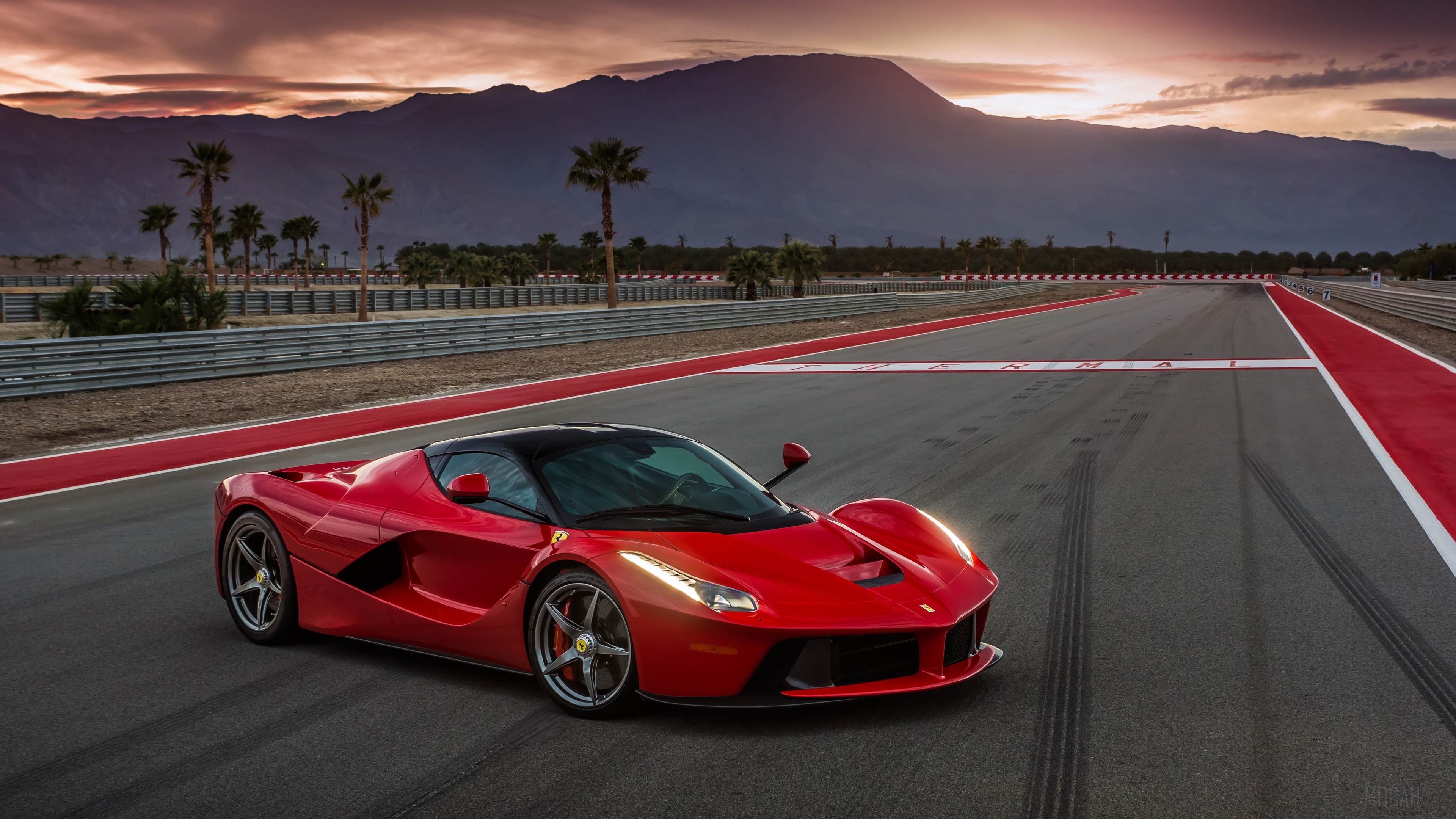 Red Ferrari LaFerrari on a Race Track HD Wallpaper