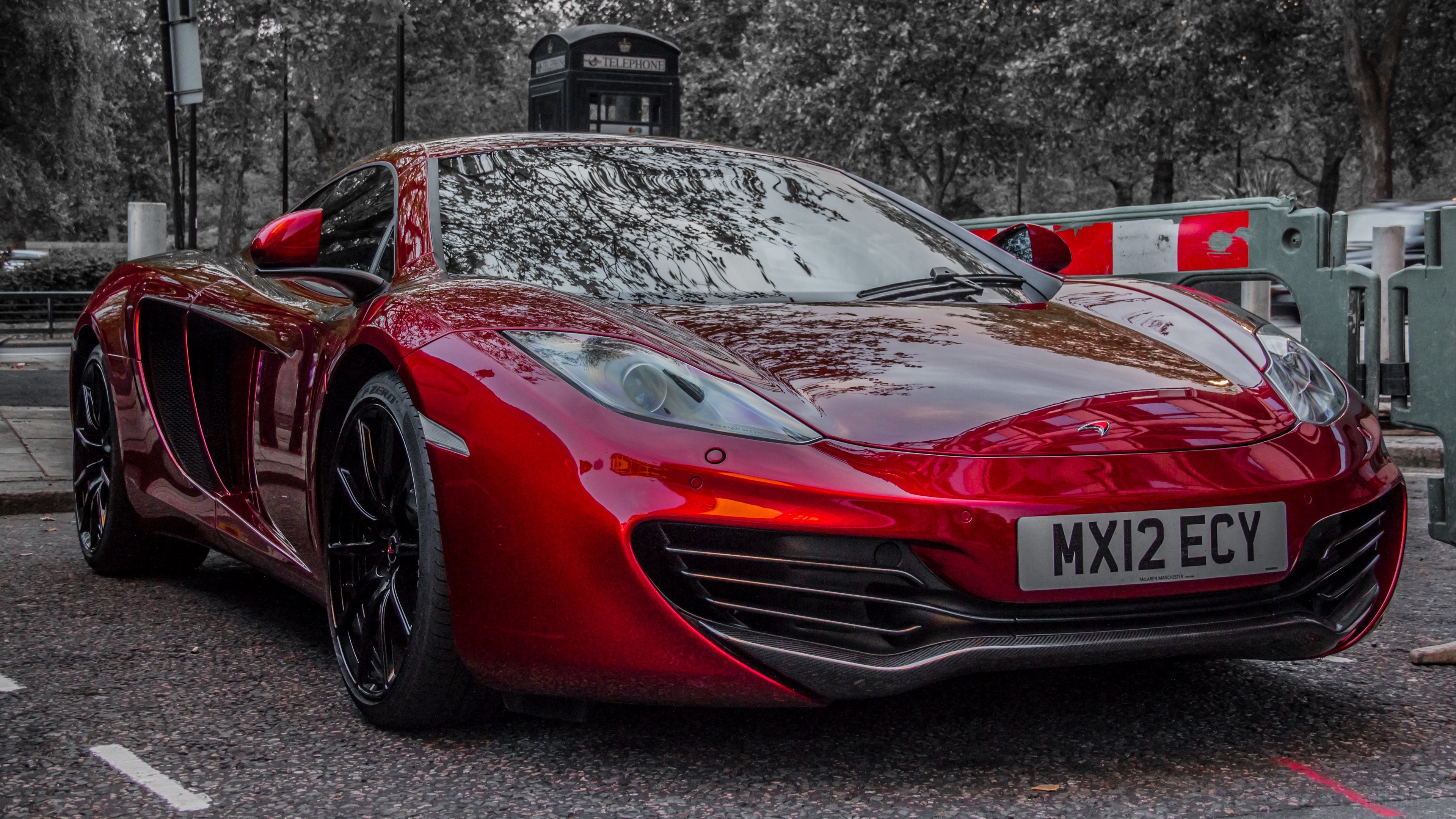 Red McLaren MP4-12C sportscar with license plate MX12 ECY HD Wallpaper