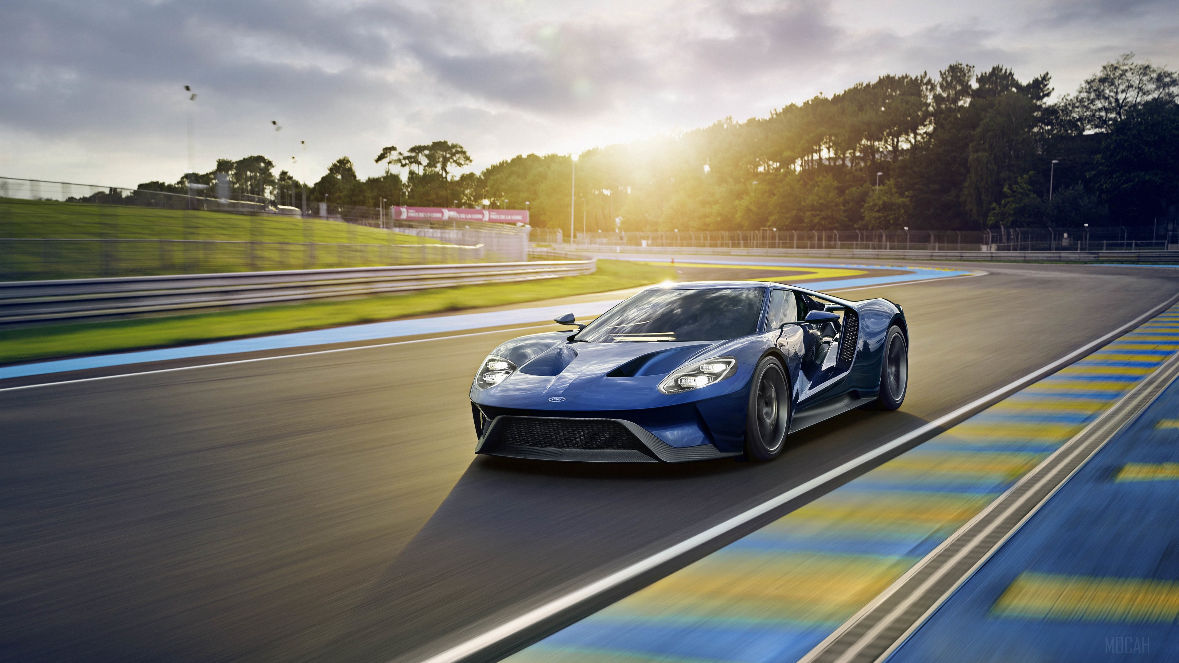 Blue Ford GT sports car on a race track 4K HD Wallpaper