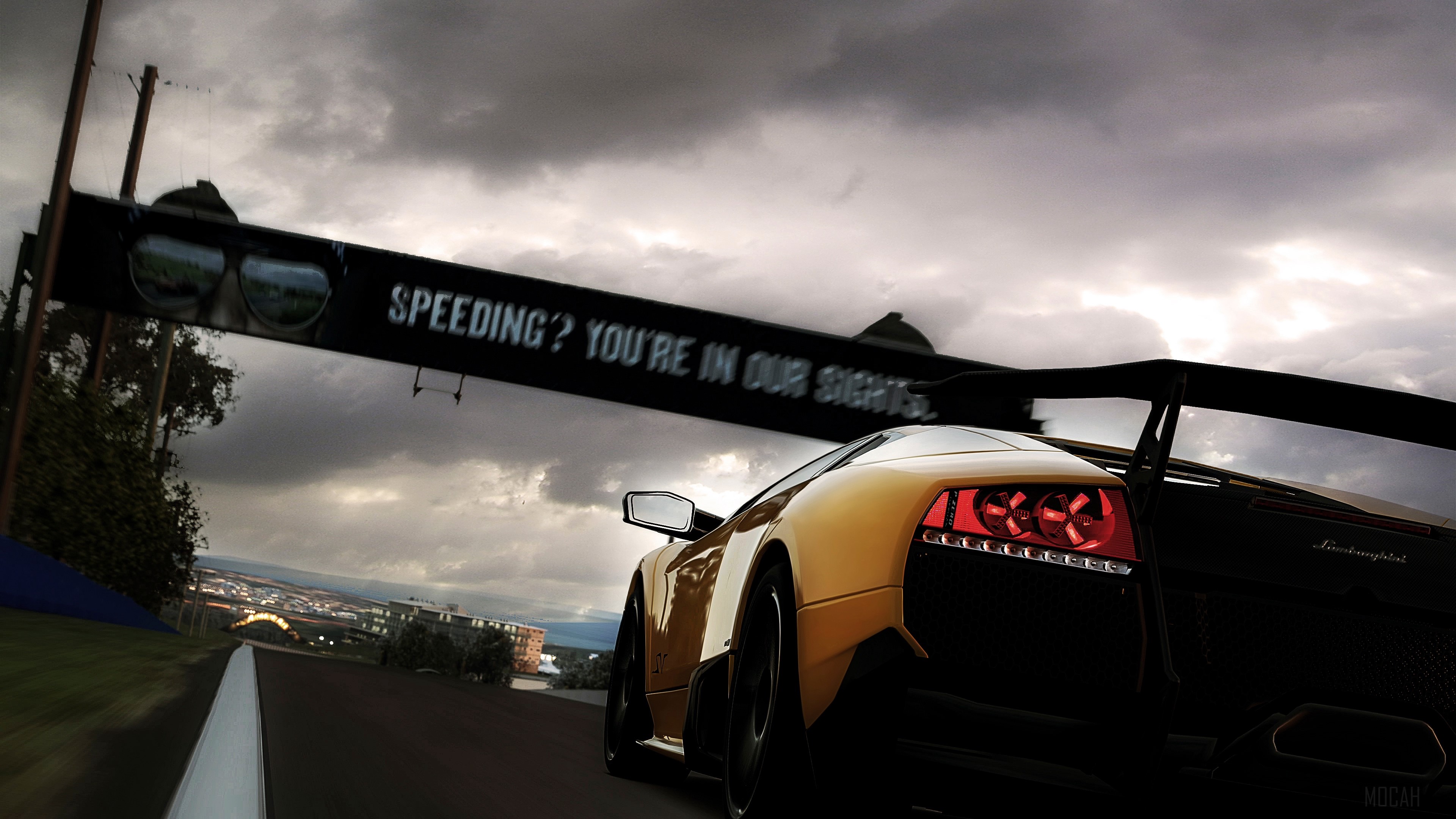 Yellow Lamborghini on a Race Track HD Wallpaper