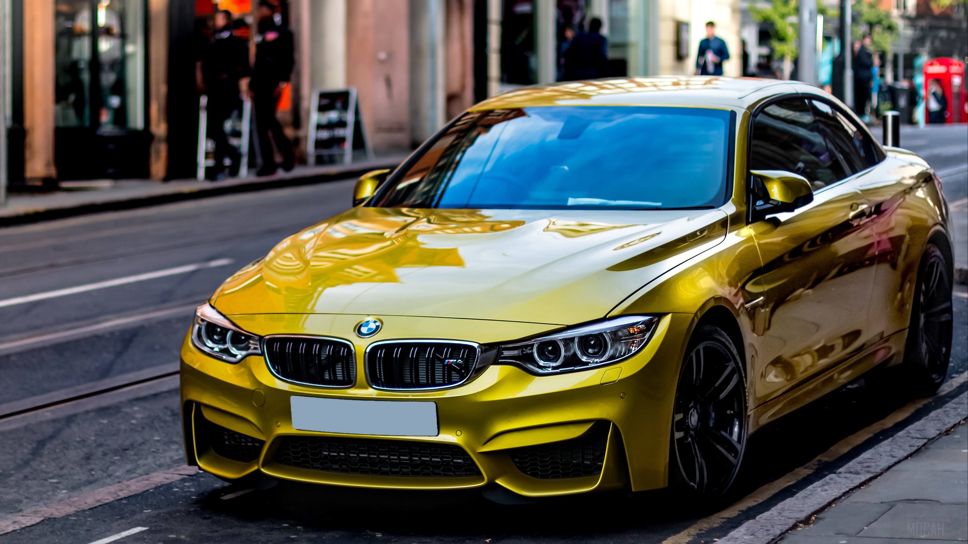 Yellow BMW M4 Coupe on City Street 4K HD Wallpaper