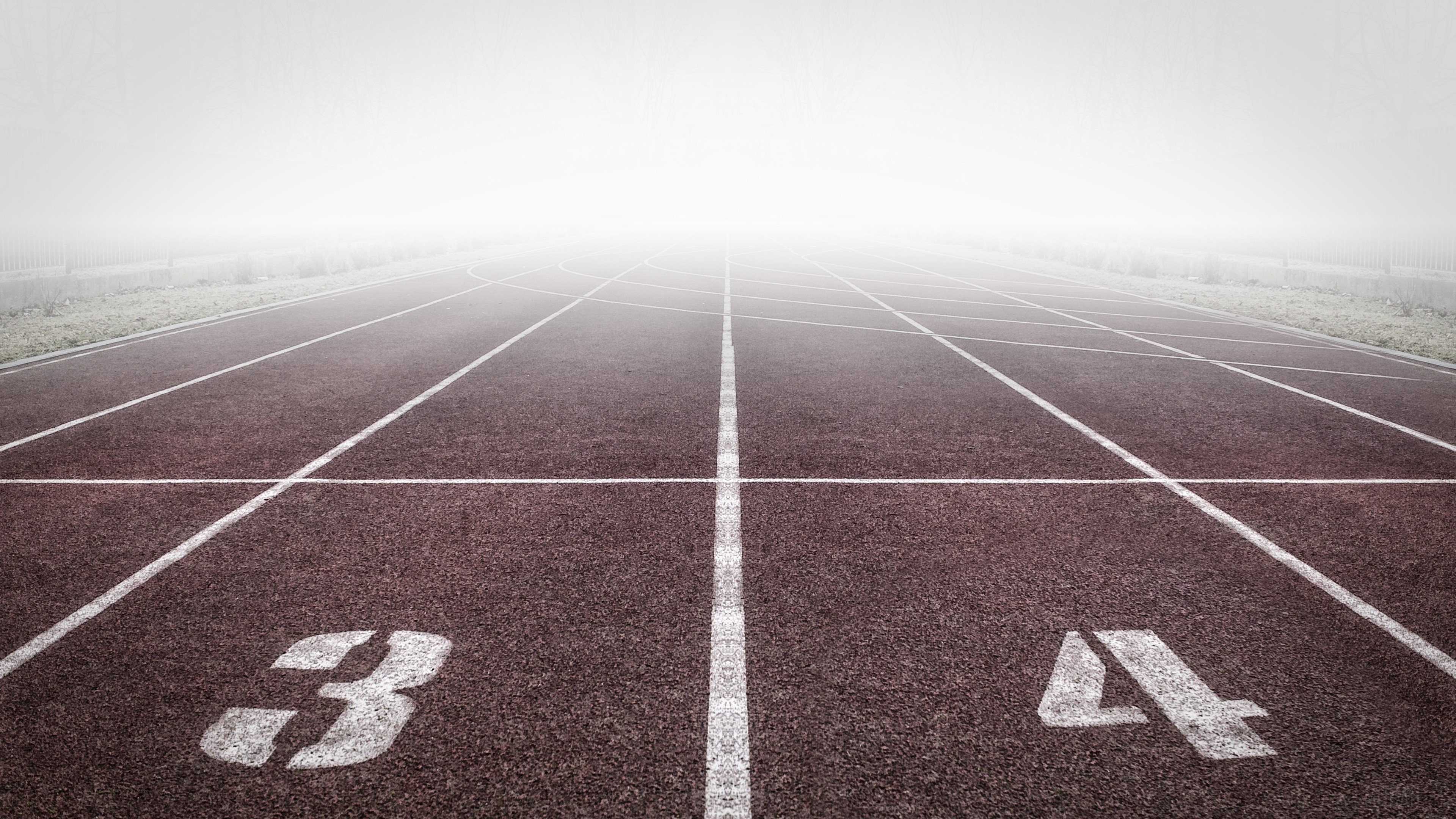 Running track lanes 3 and 4 in fog 4K HD Wallpaper