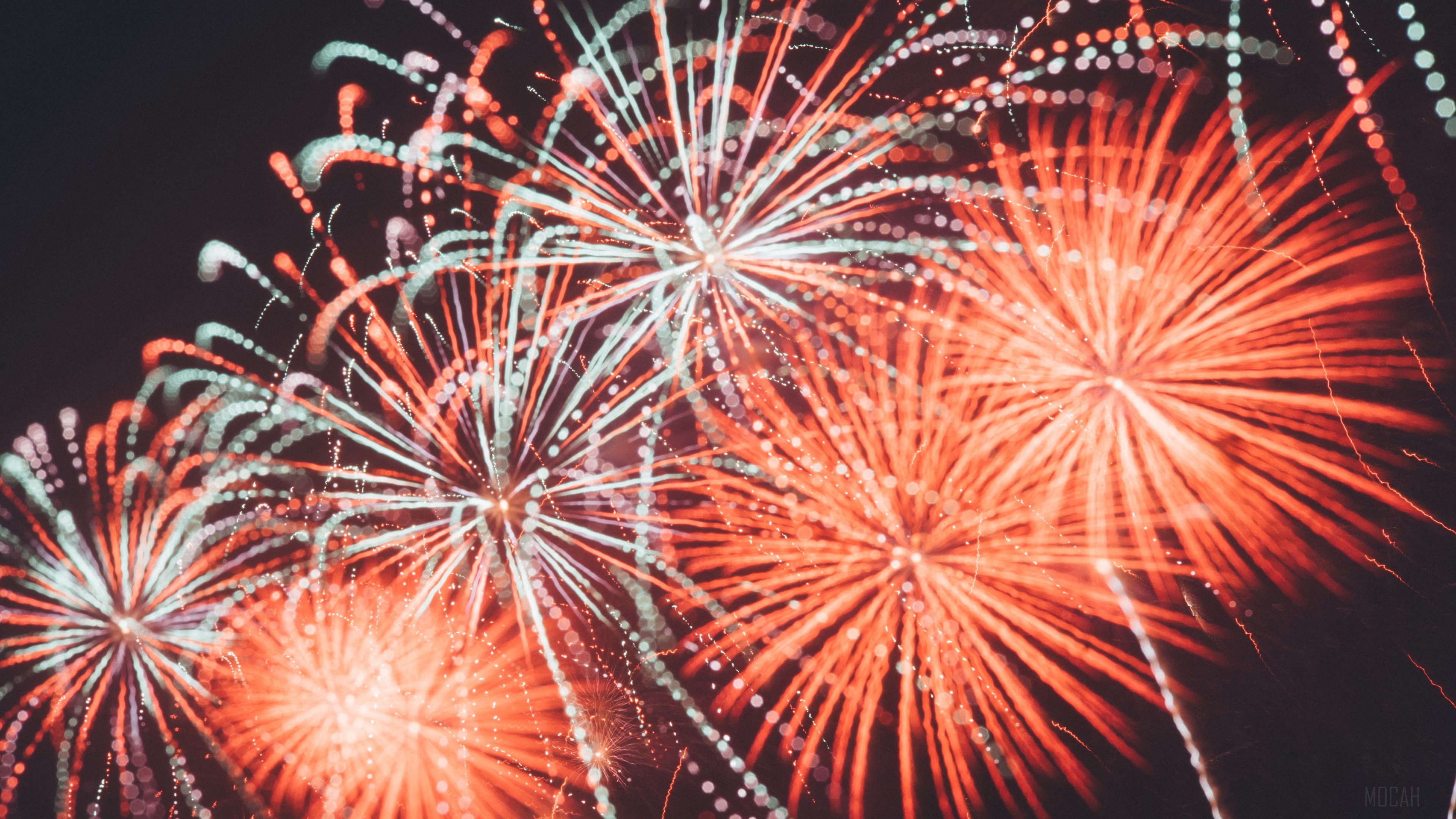 Fireworks display with red and white lights HD Wallpaper