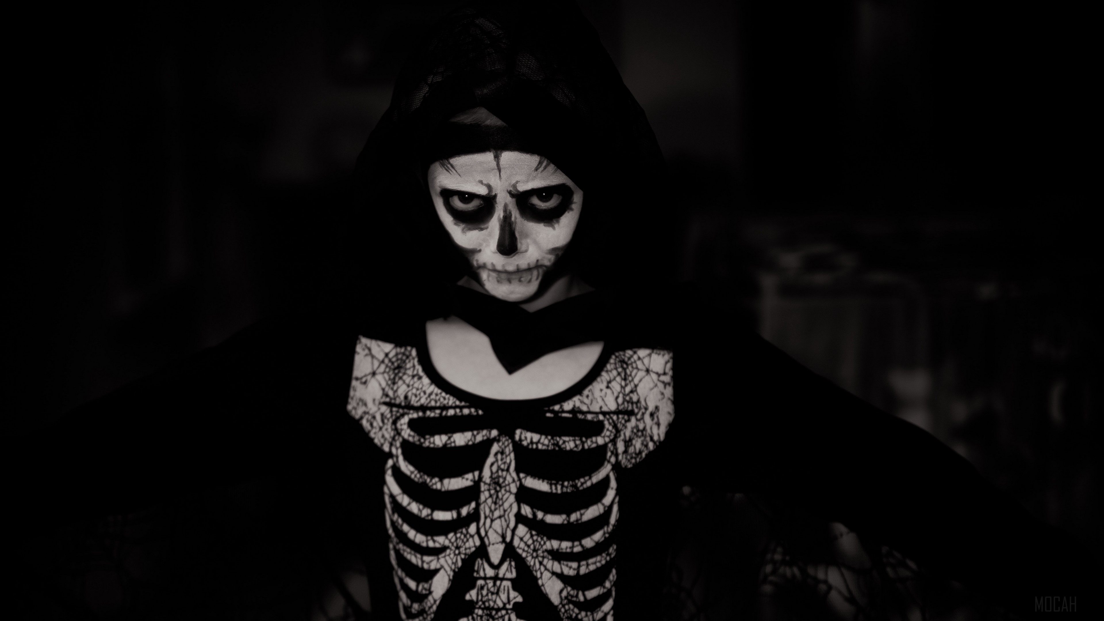 Child in skeleton costume with skull face paint HD Wallpaper
