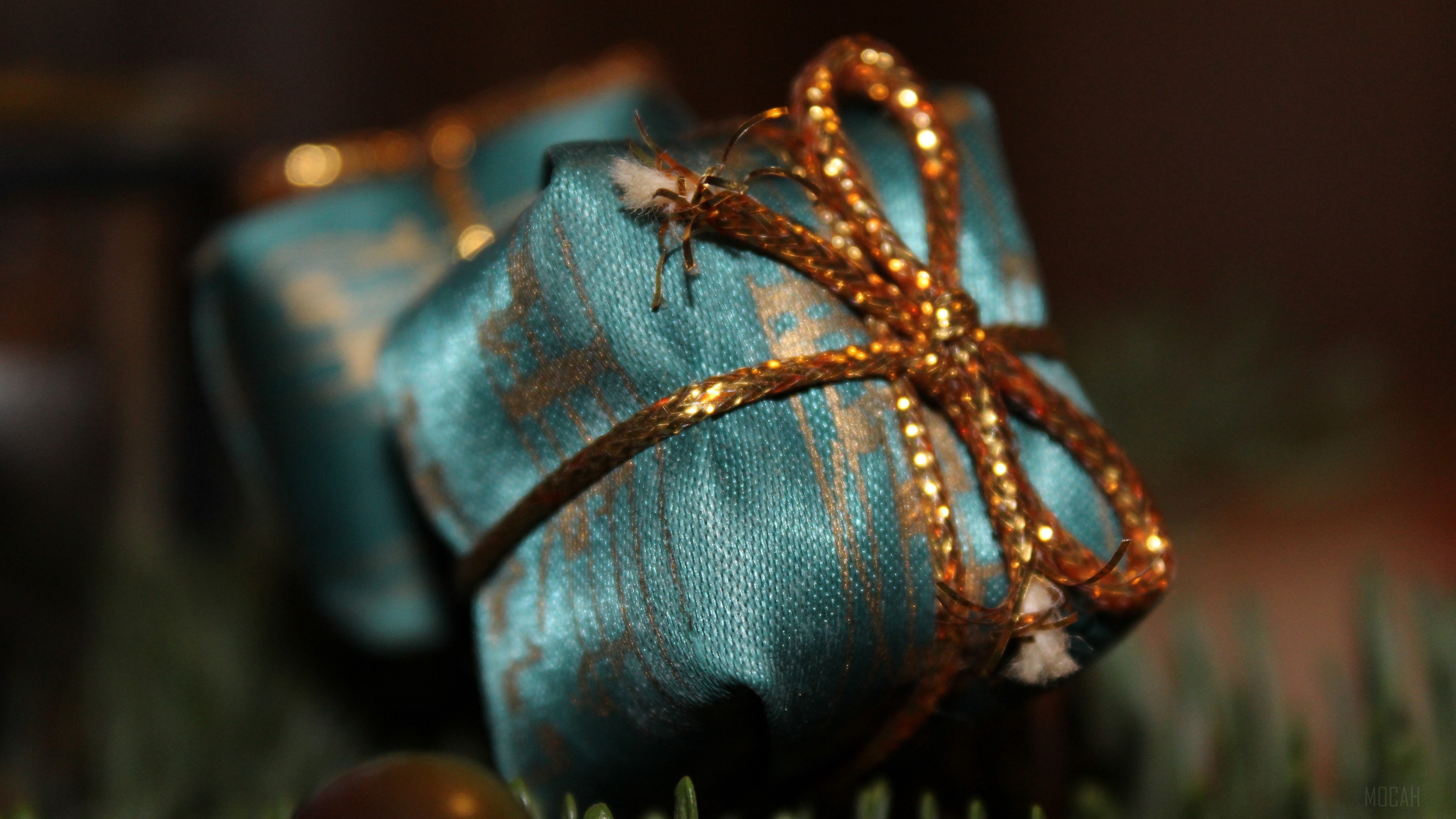 Teal Christmas gift with gold ribbon 4K HD Wallpaper