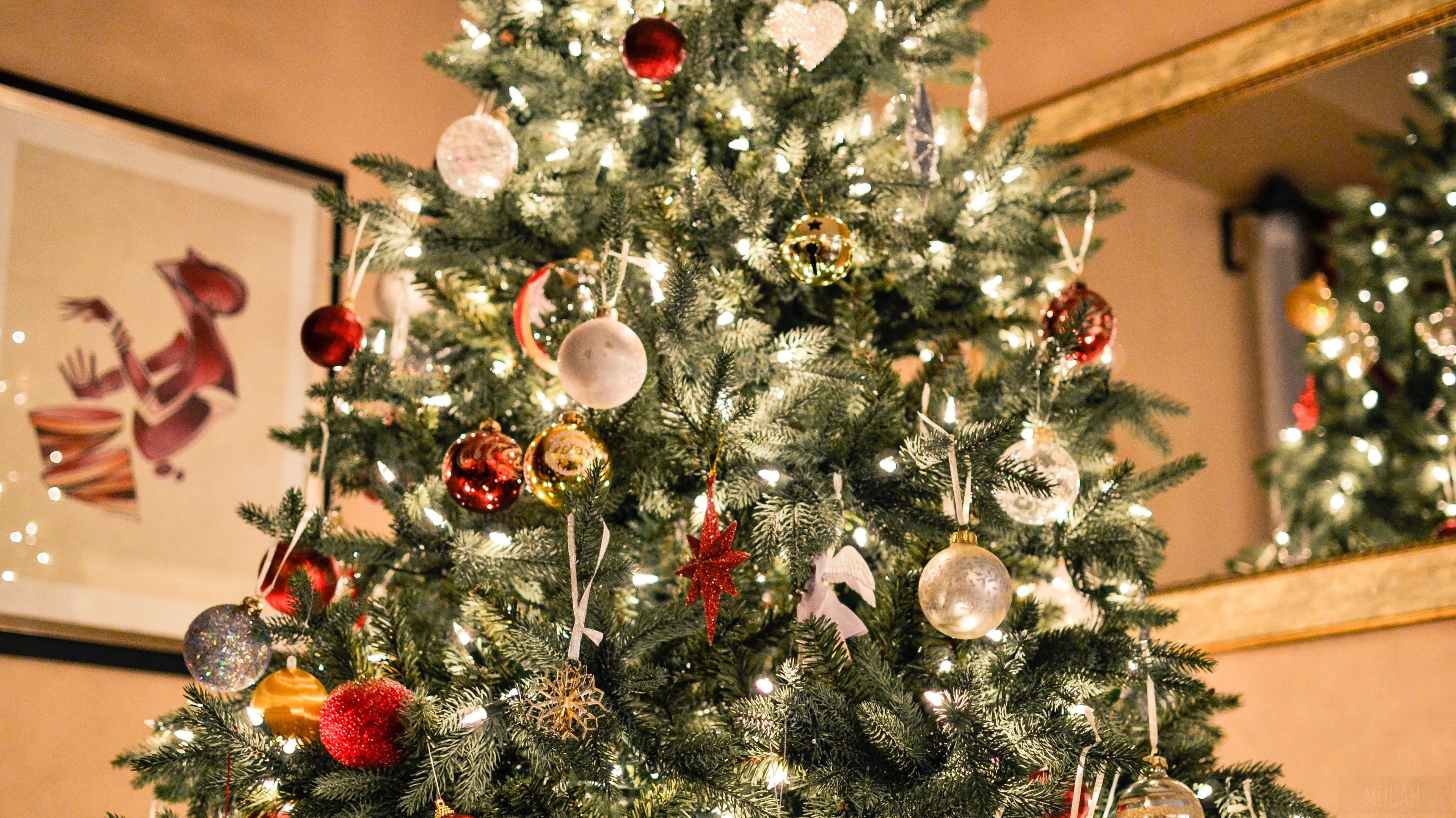 Christmas tree with ornaments and lights 4K HD Wallpaper