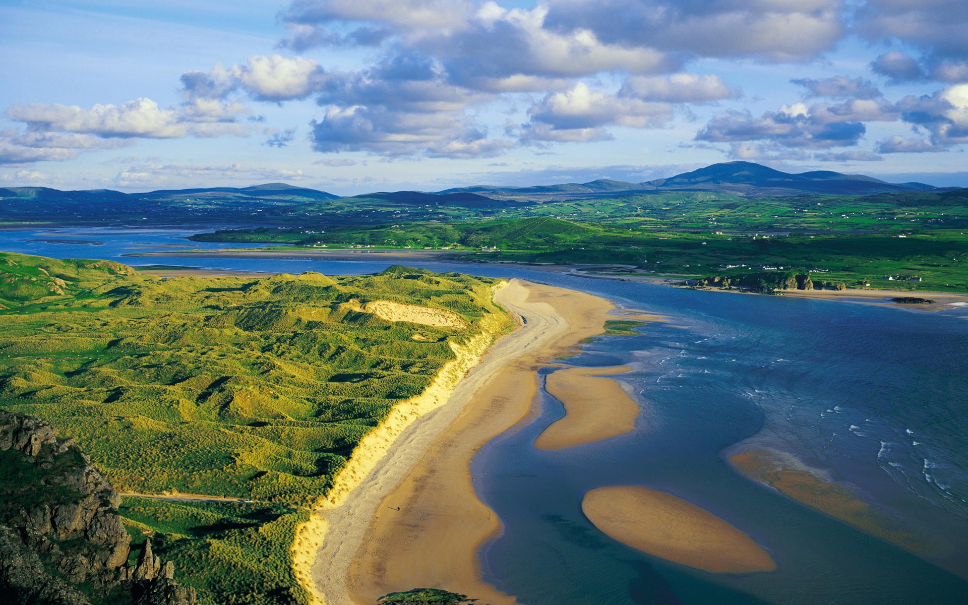 Coastal landscape with sand dunes and mountains HD Wallpaper