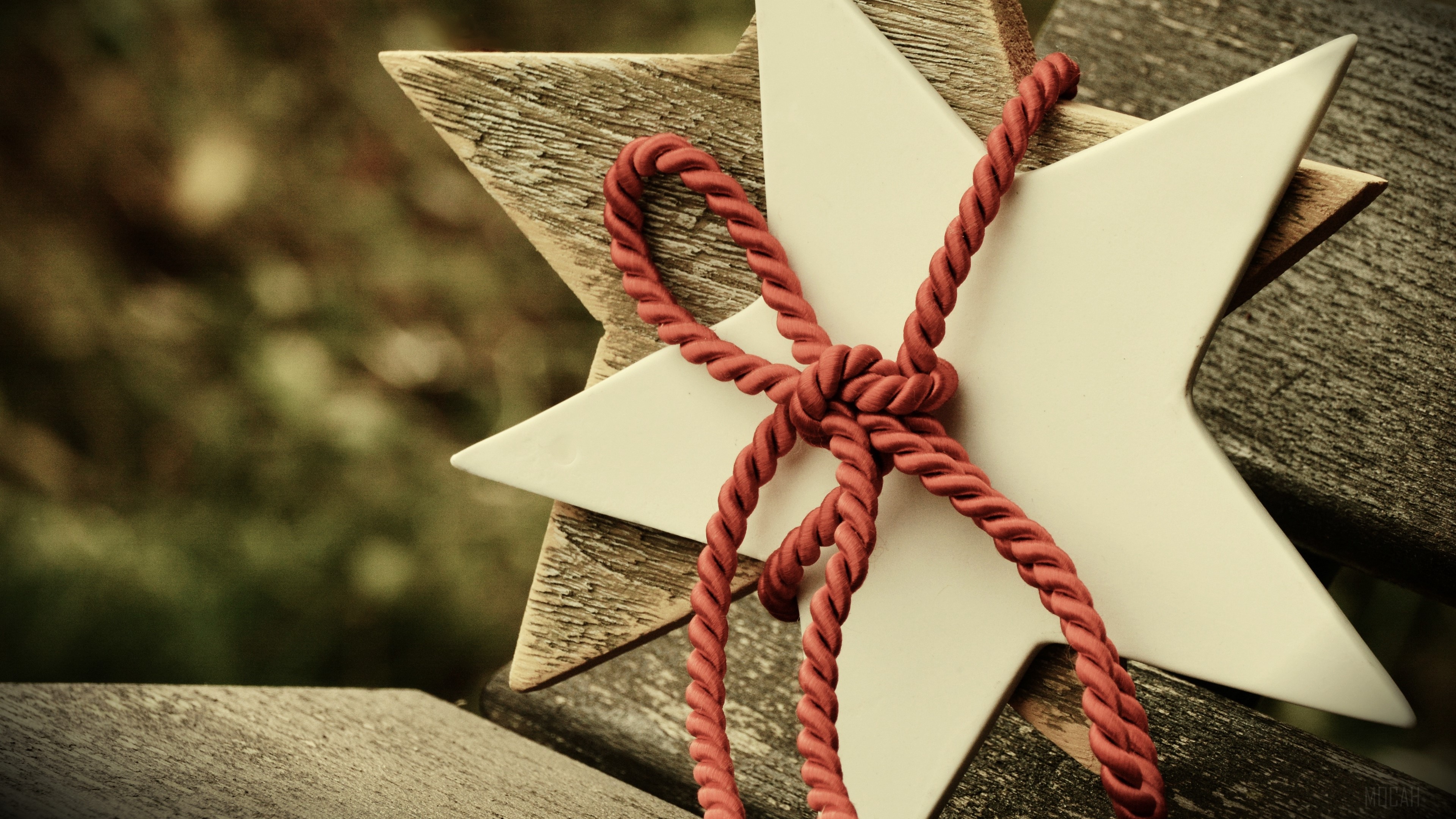 Wooden and white star with red rope 4K HD Wallpaper