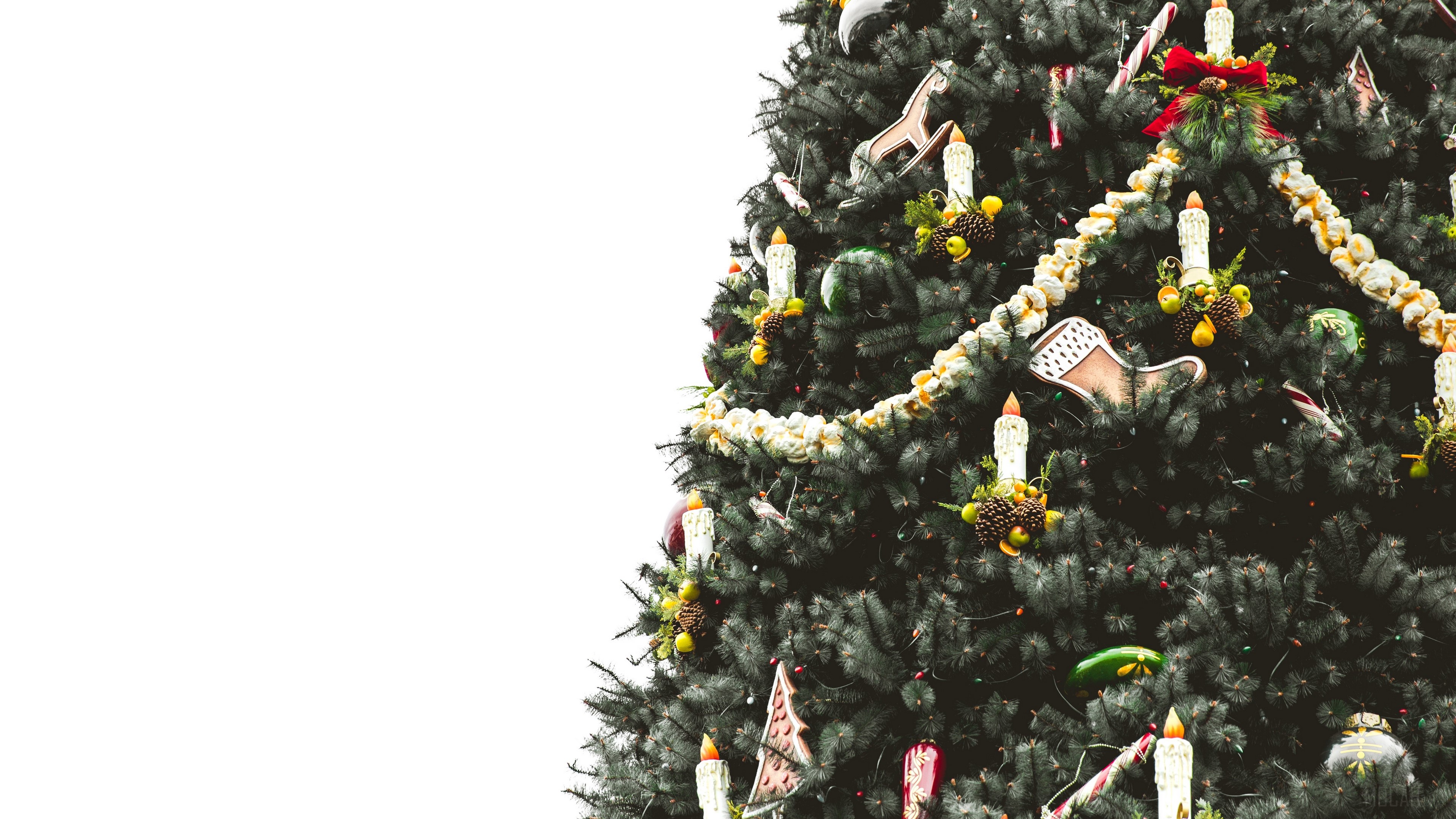 Christmas tree with ornaments and candles 4K HD Wallpaper