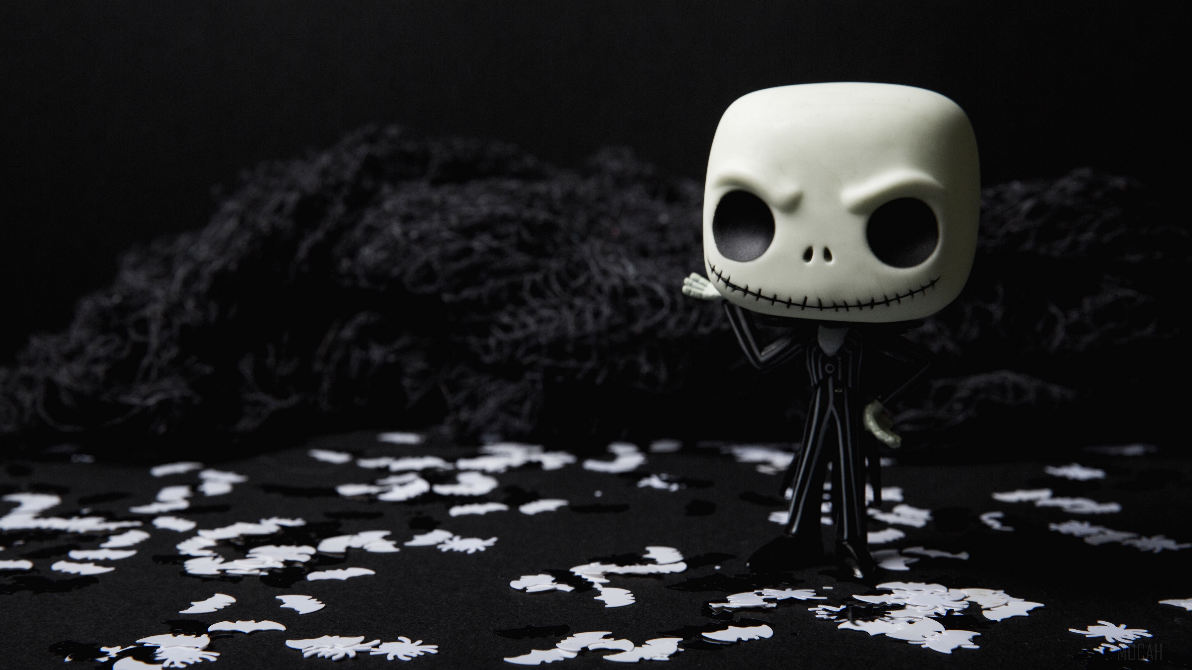 Jack Skellington Funko Pop figure on black background with confetti HD Wallpaper