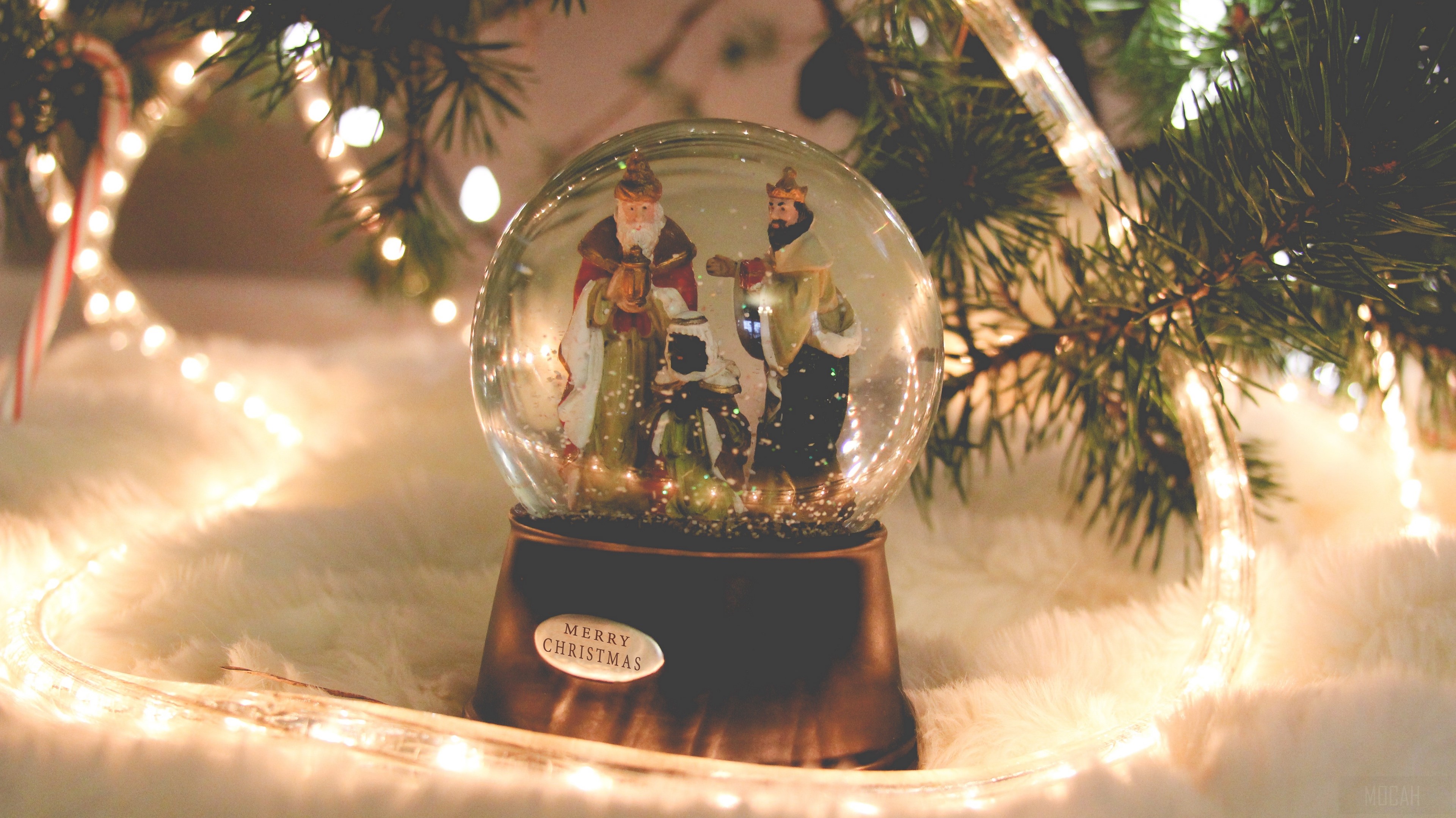 Christmas snow globe with nativity scene and lights HD Wallpaper