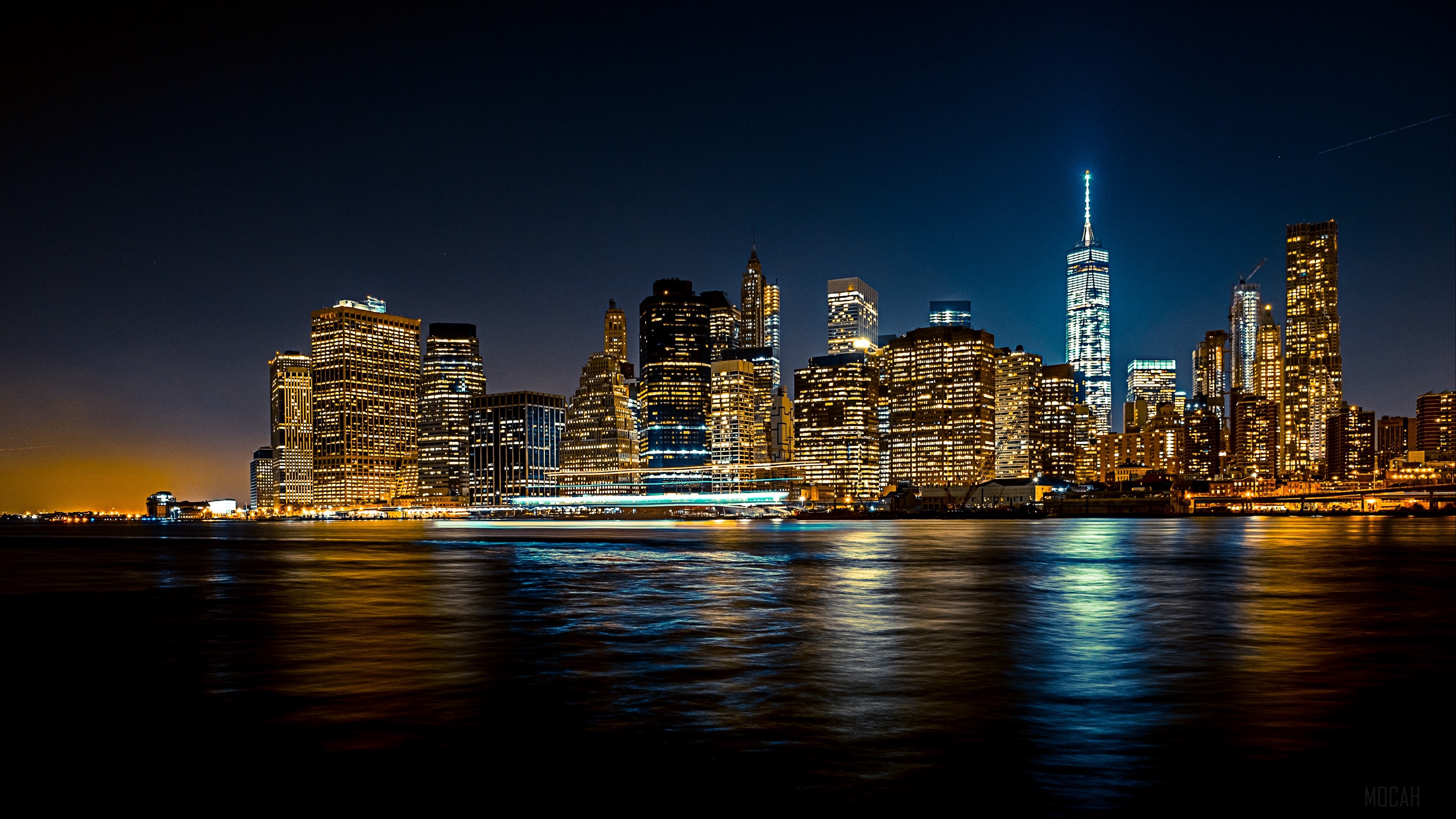 New York City skyline at night with reflections HD Wallpaper