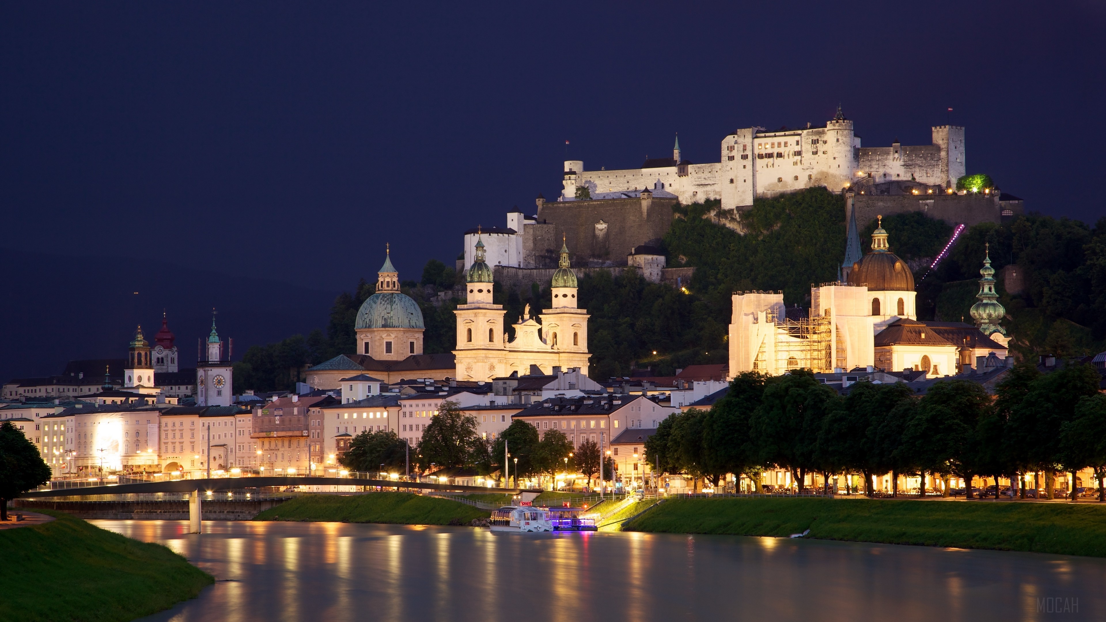 Salzburg cityscape with Hohensalzburg Fortress at night HD Wallpaper