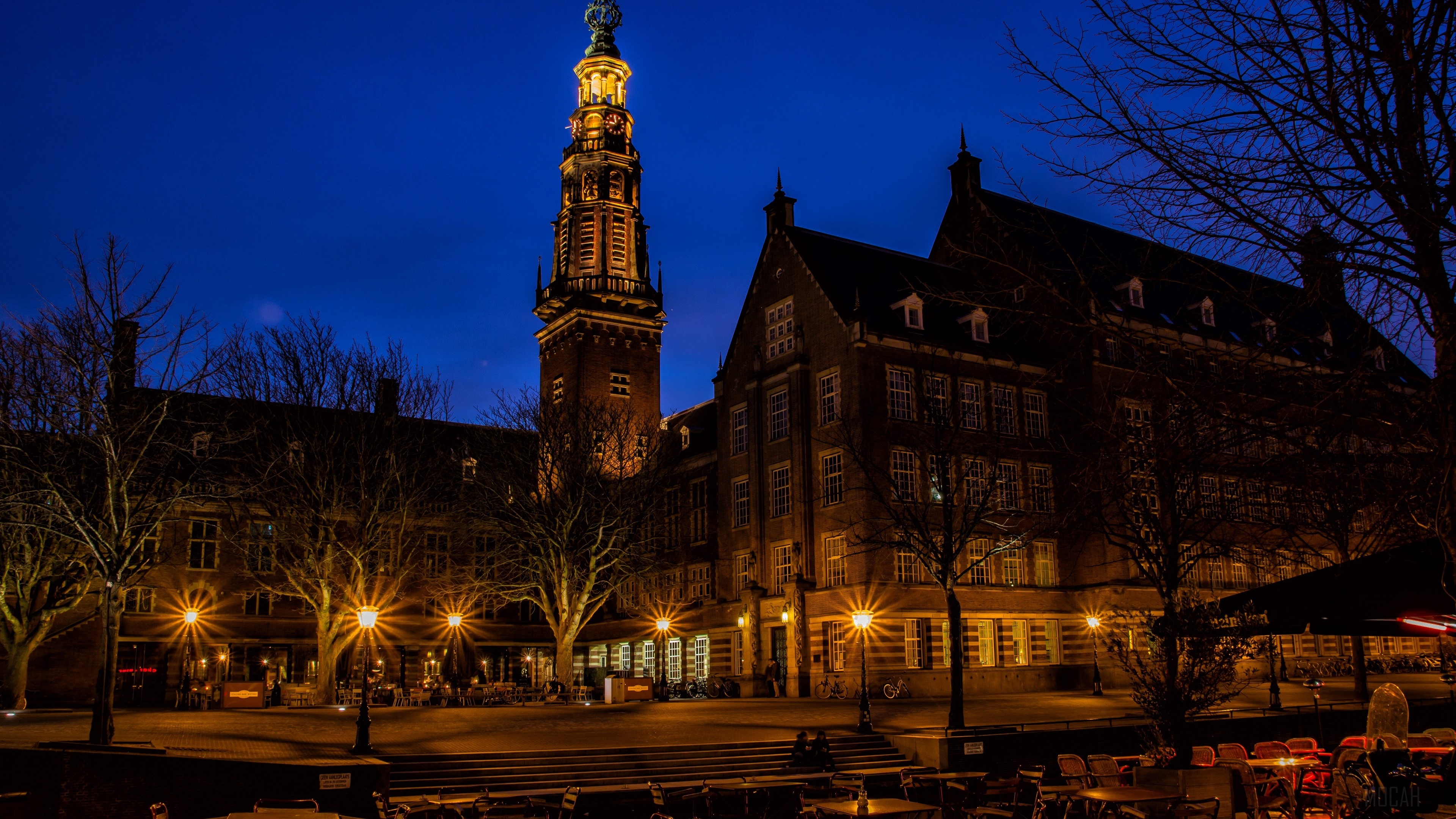 Building and tower at night in Holland 4K HD Wallpaper