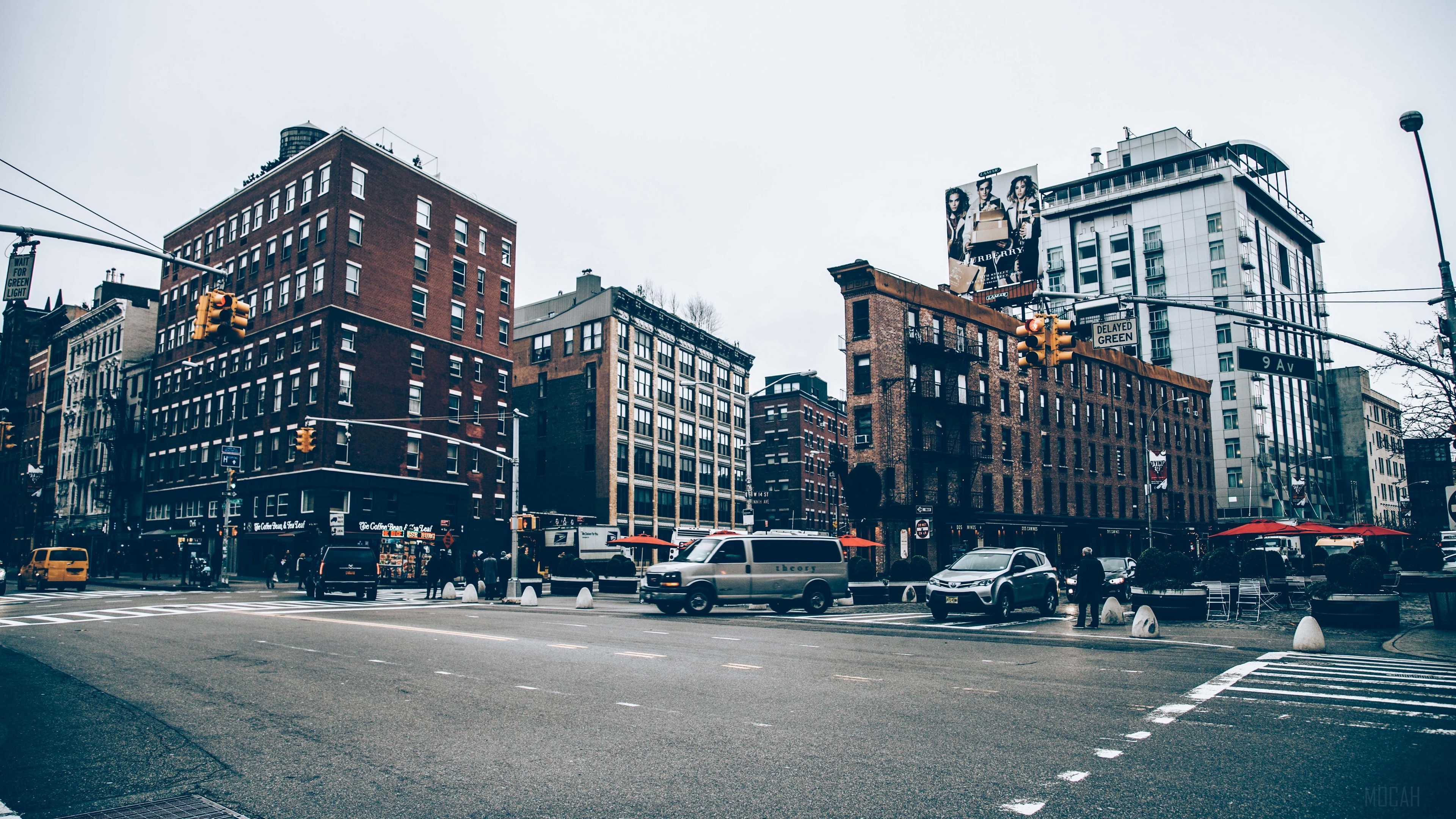 Street scene with buildings and traffic HD Wallpaper
