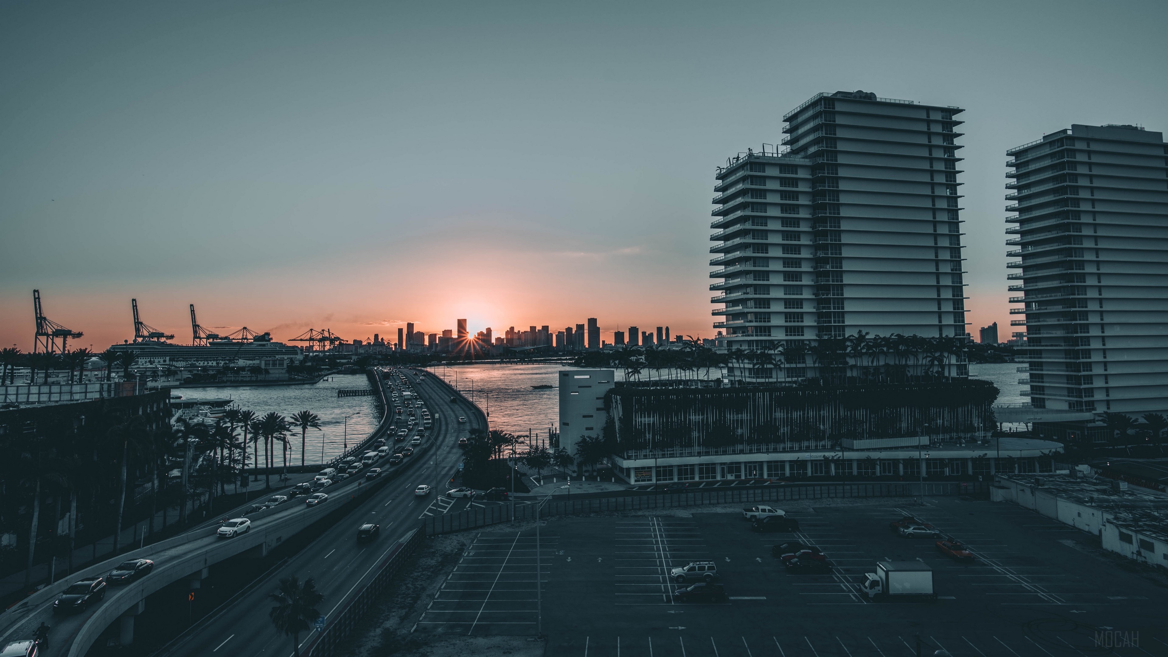 Miami Cityscape with Bridge and Cranes at Sunset 4K HD Wallpaper