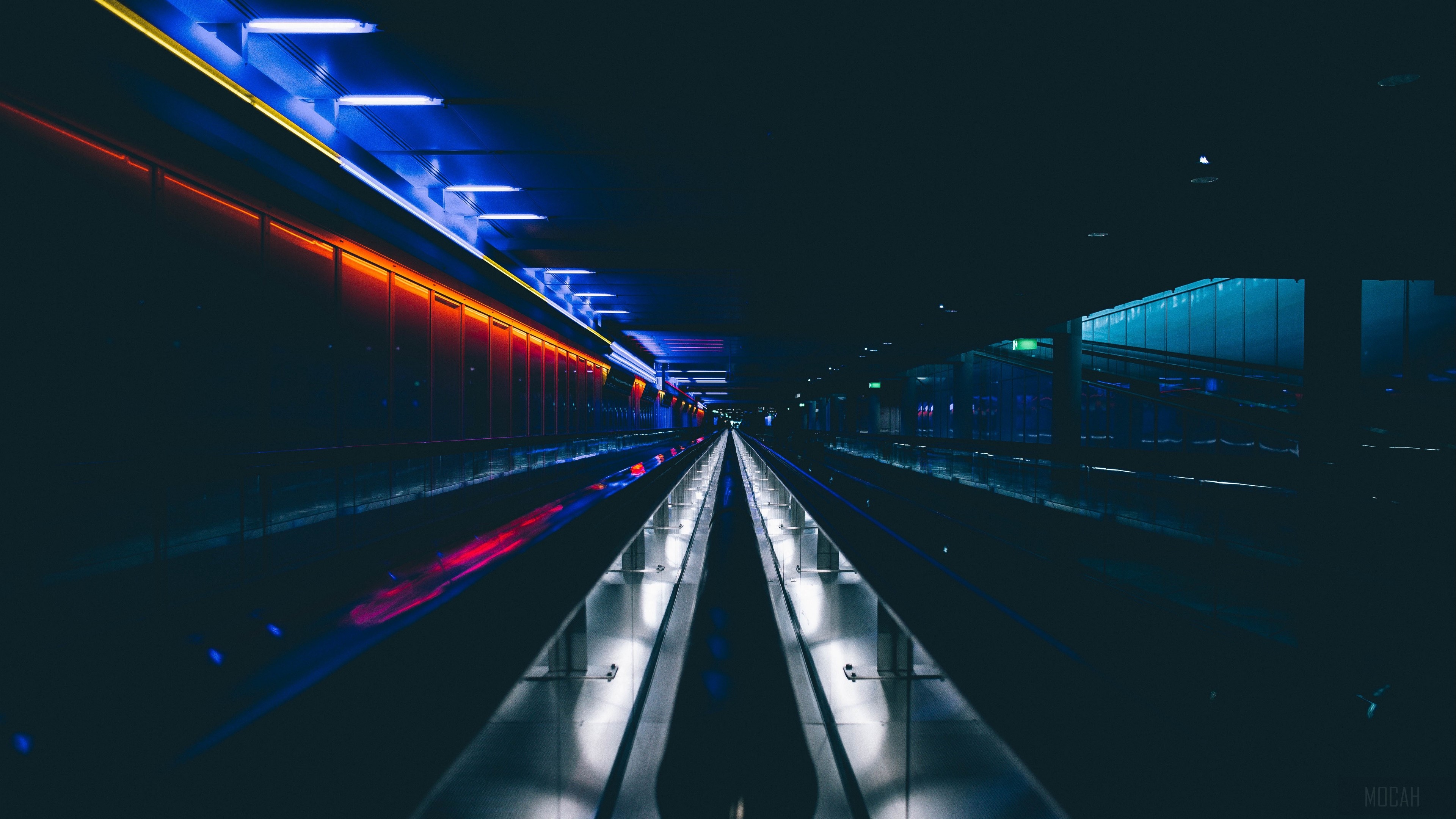 Underground tunnel with blue and orange lights 4K HD Wallpaper