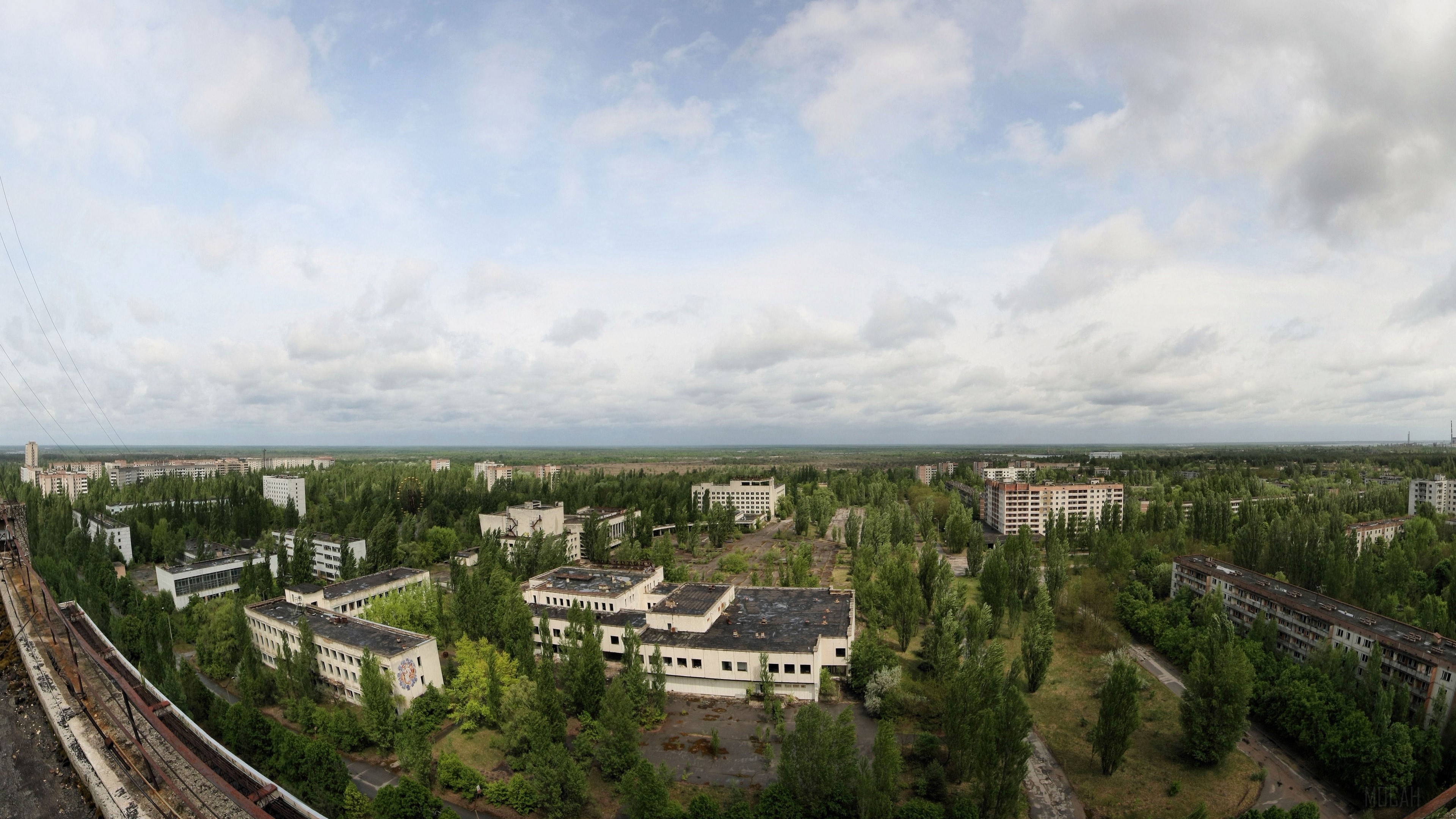 Abandoned apartments and trees in a ghost town 4K HD Wallpaper