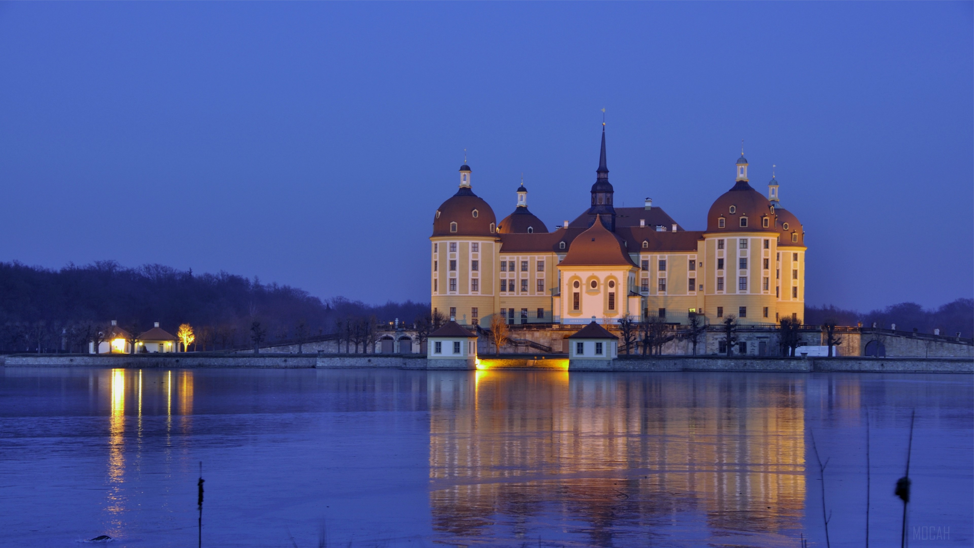 Moritzburg Castle reflected in water at dusk, Germany 4K HD Wallpaper