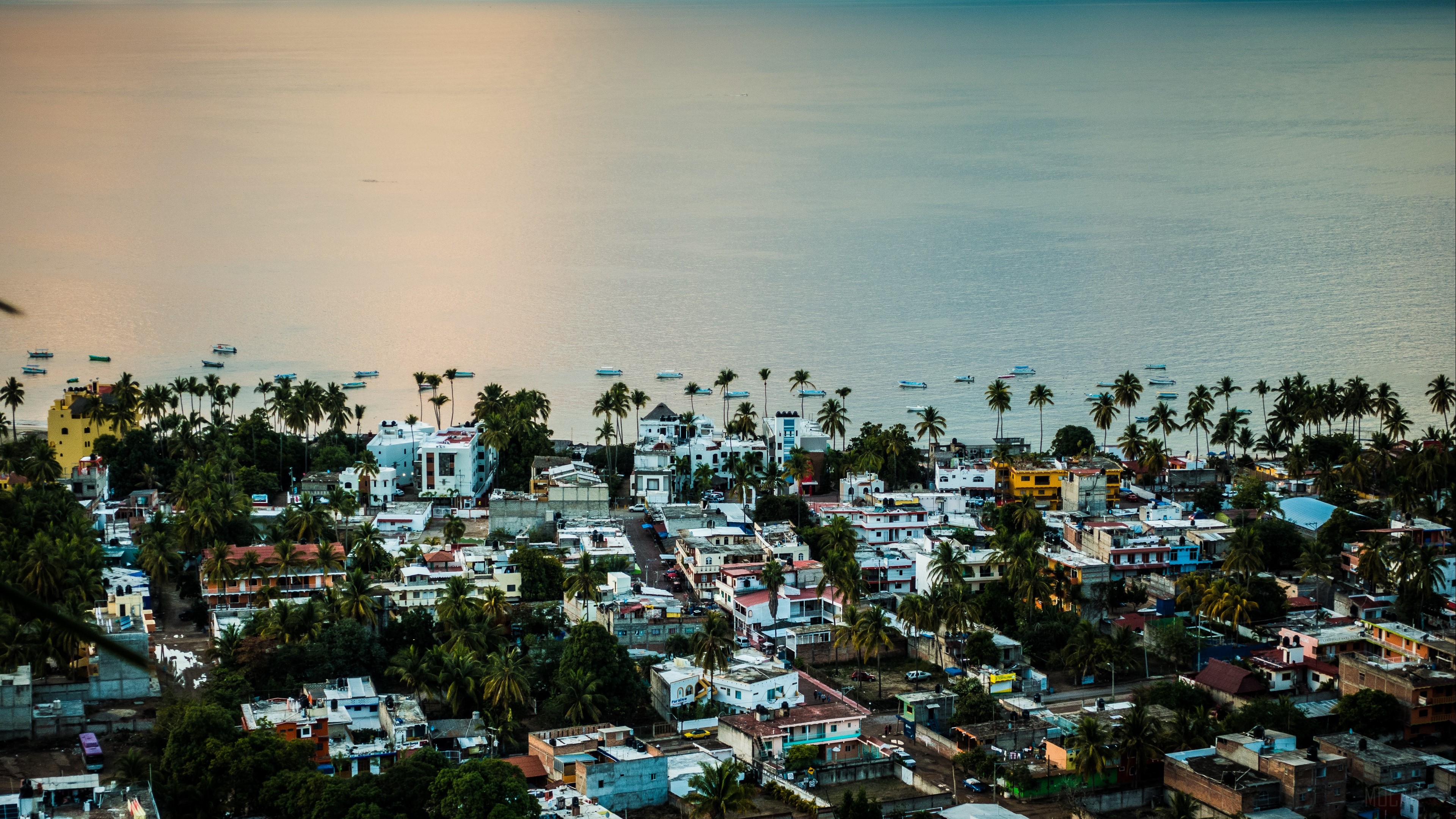 Coastal town with buildings and boats in Mexico 4K HD Wallpaper