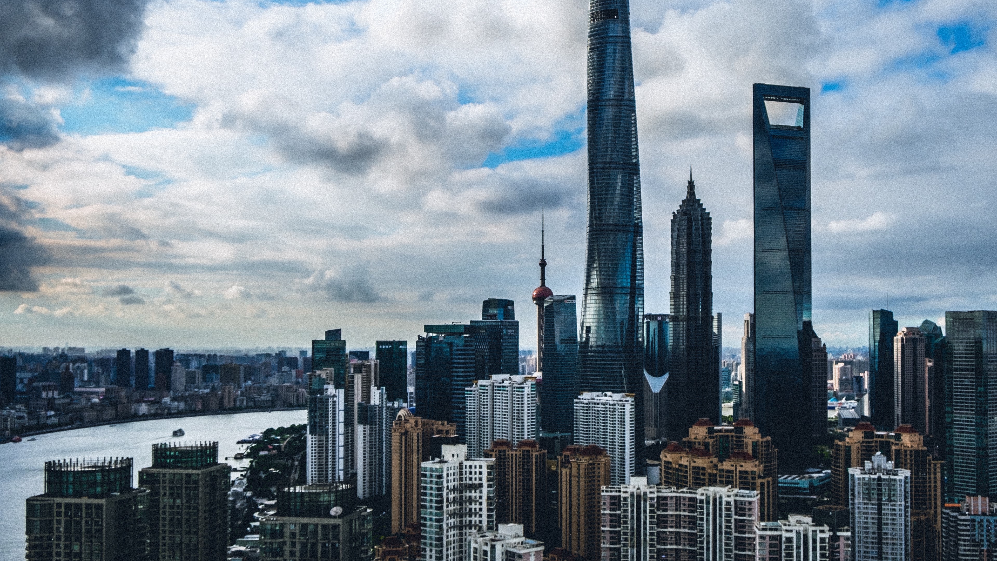 Shanghai skyscrapers and river 4K HD Wallpaper