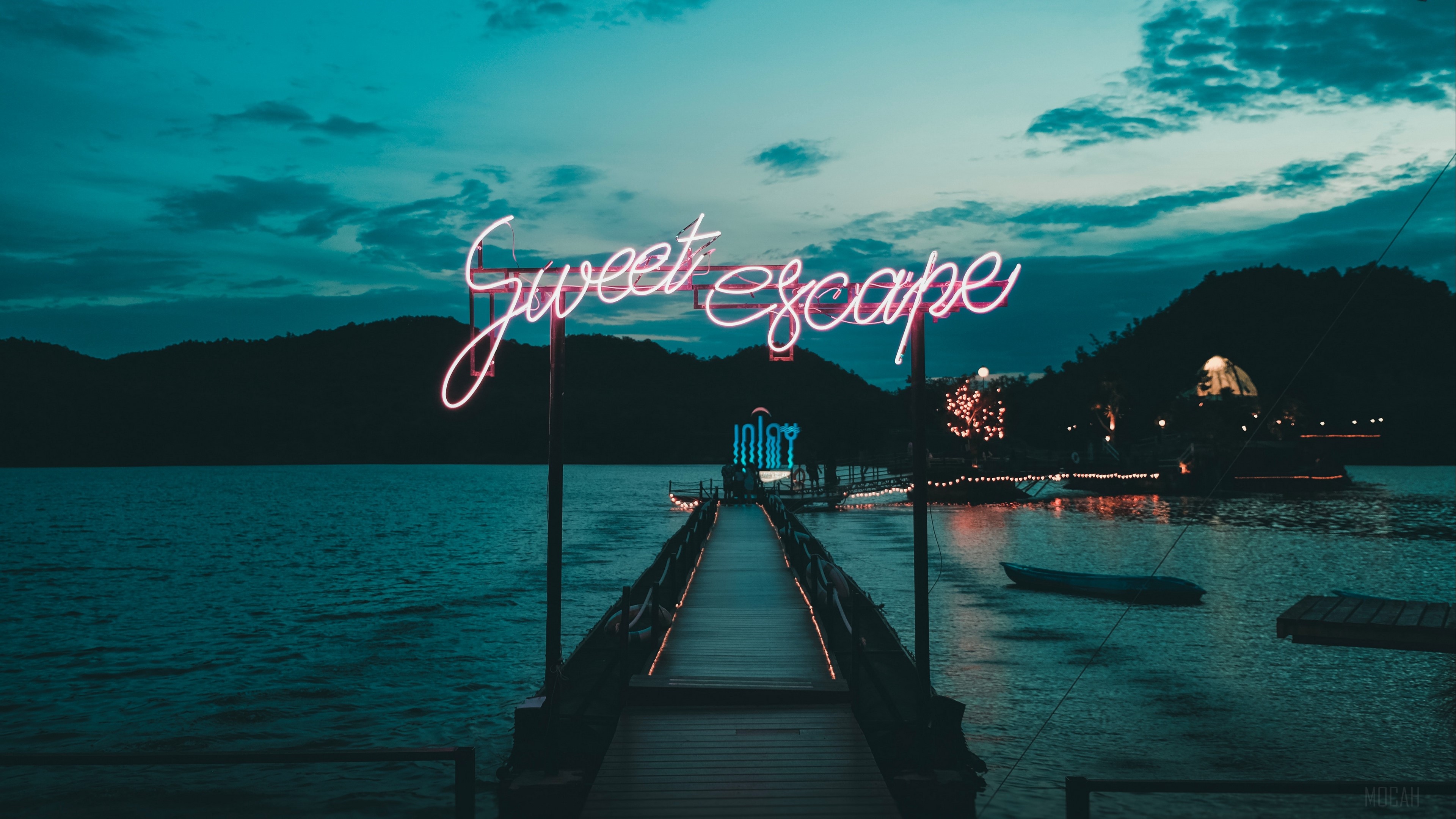 Sweet Escape neon sign over a pier at dusk HD Wallpaper