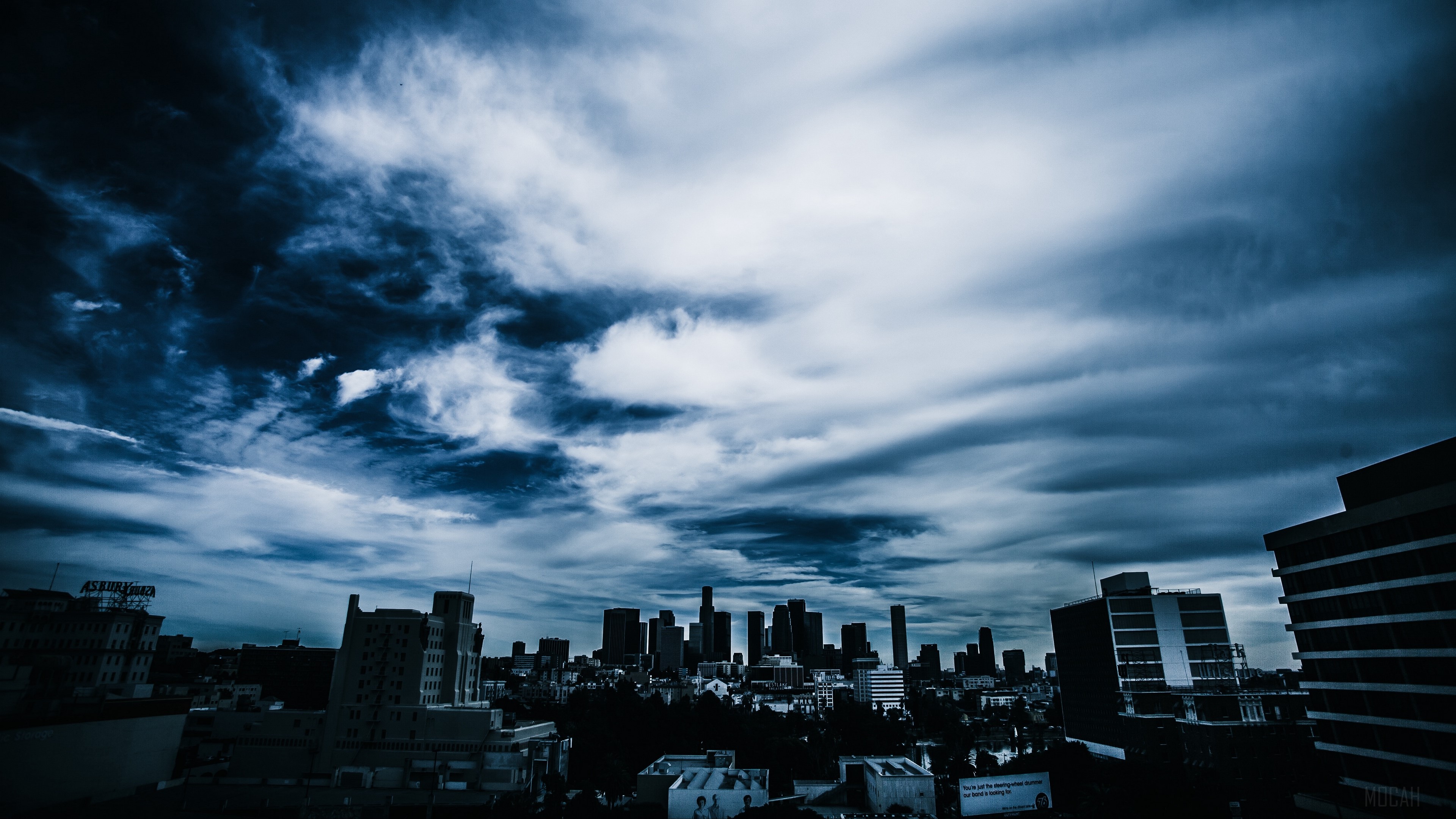 Cityscape with Dramatic Clouds HD Wallpaper