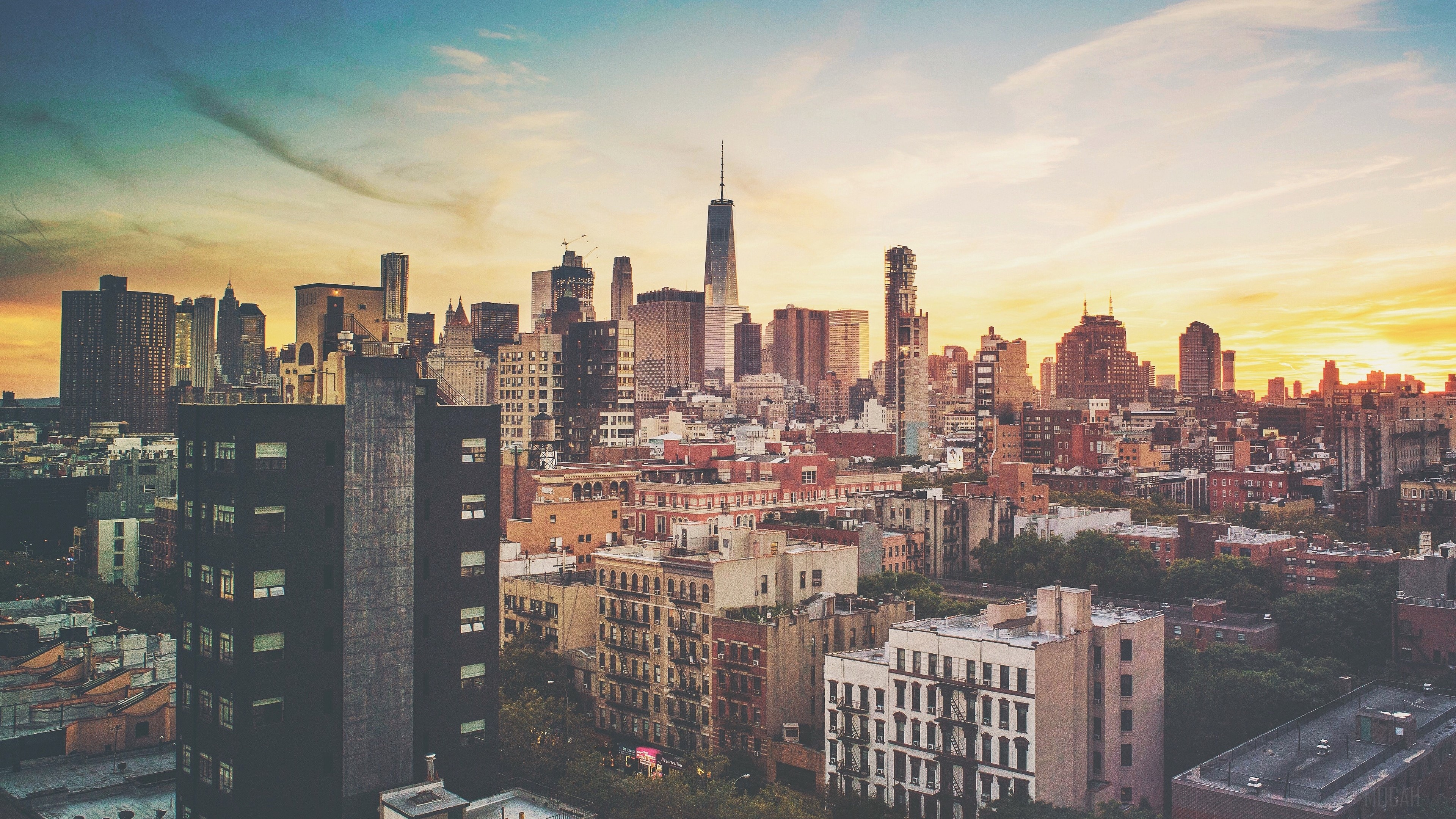New York City skyline at sunset with skyscrapers HD Wallpaper