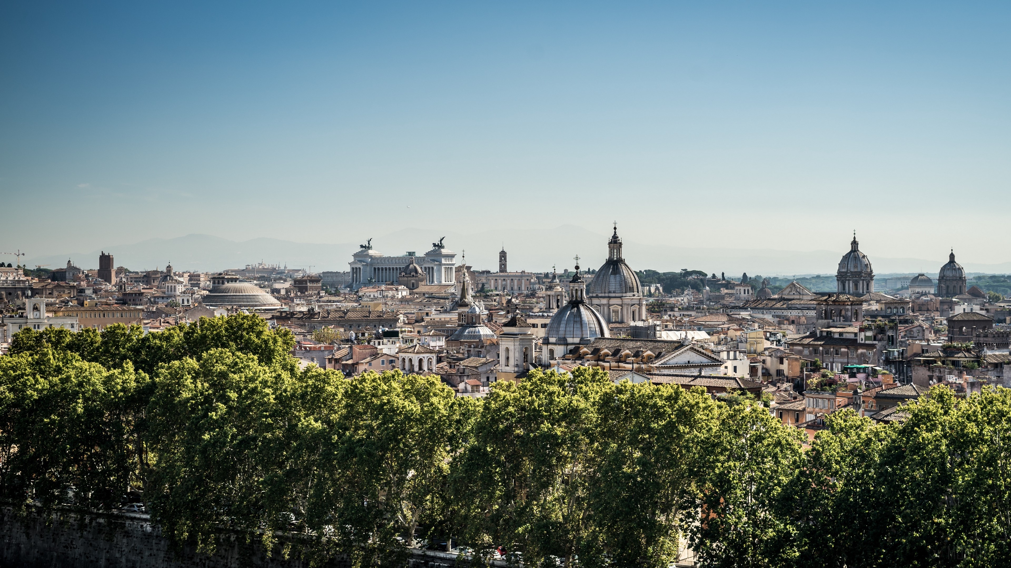 Rome cityscape with trees and historic buildings 4K HD Wallpaper