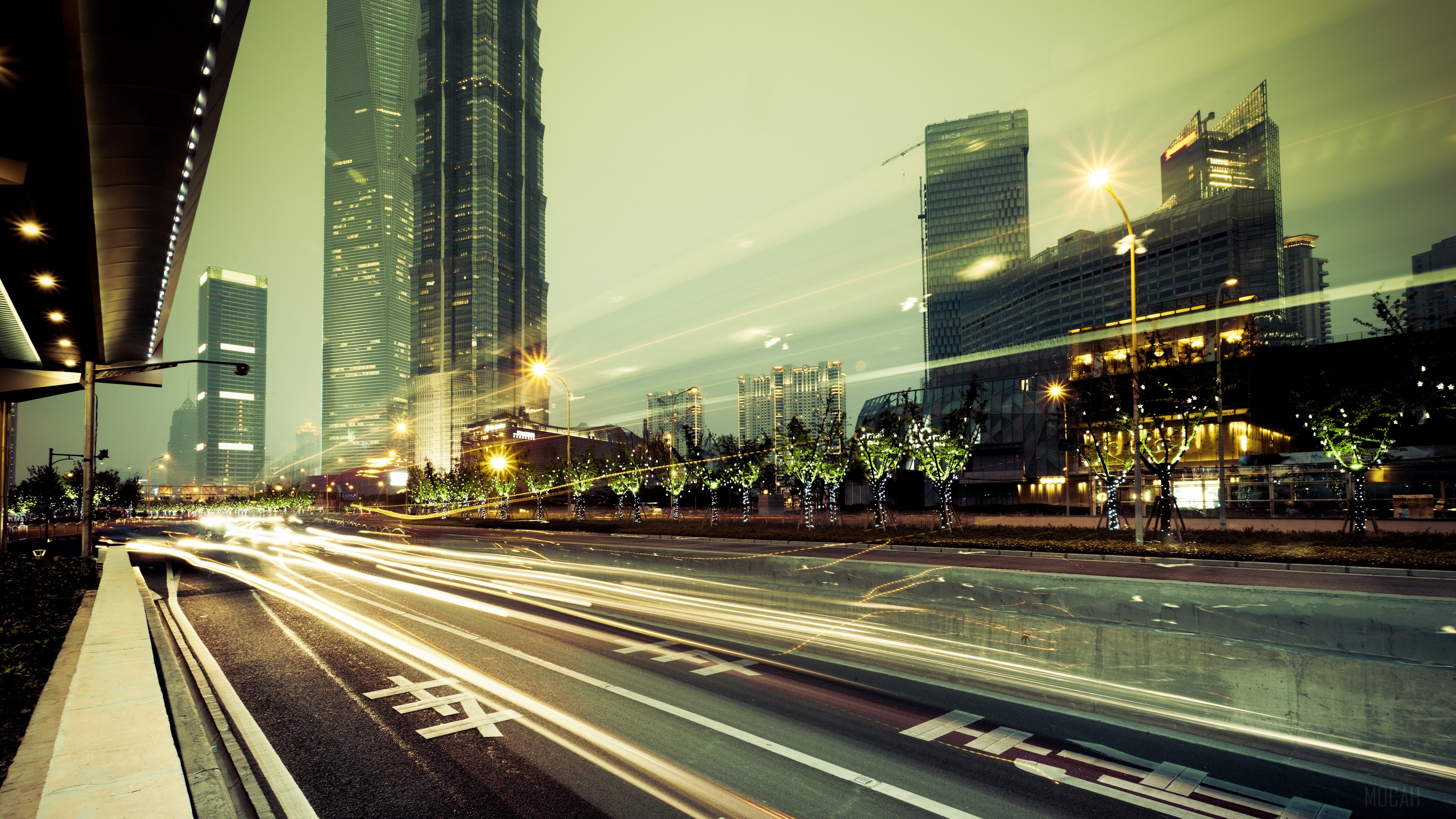 Cityscape with light trails and skyscrapers HD Wallpaper