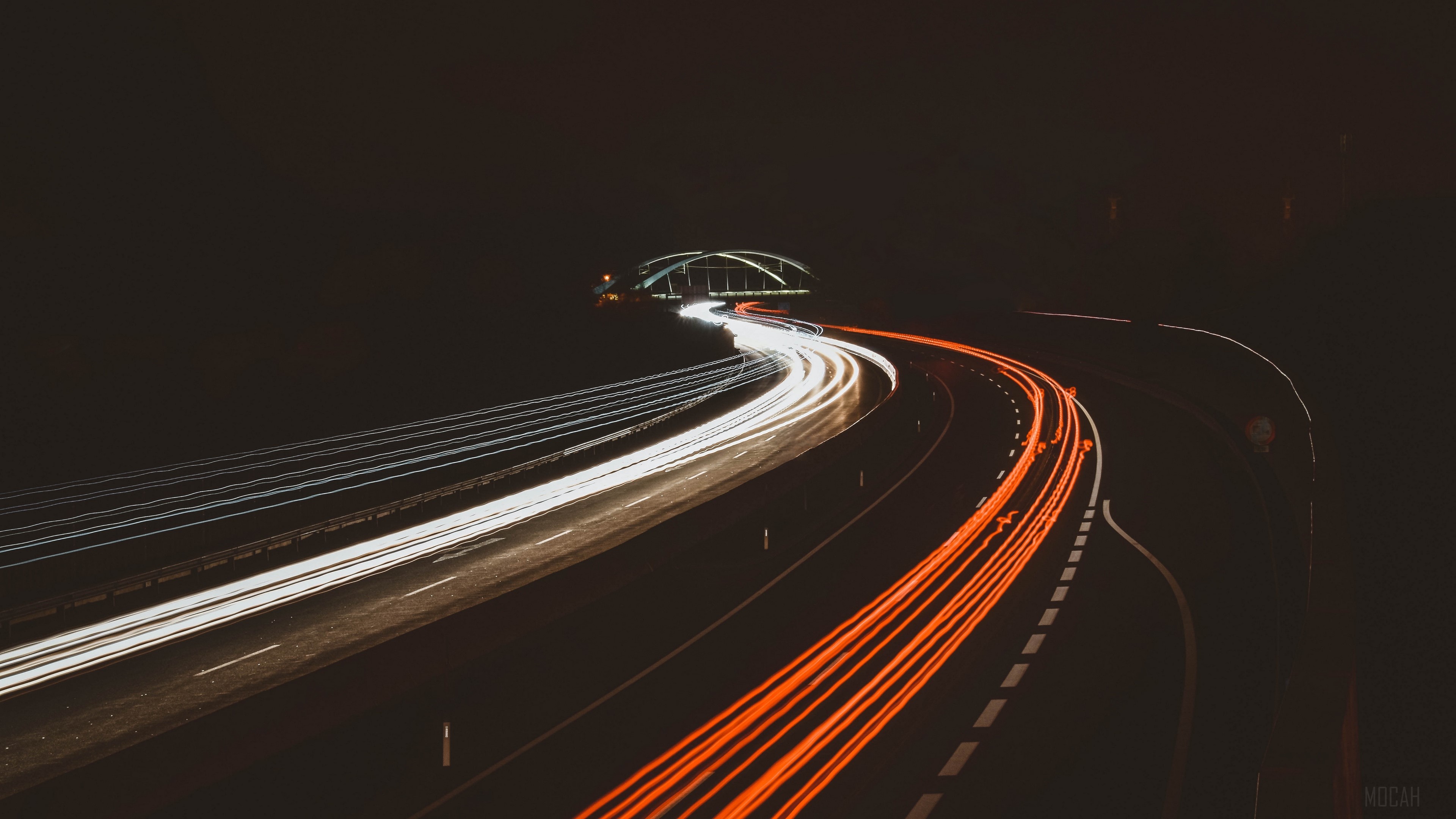 Night highway with light trails and bridge HD Wallpaper