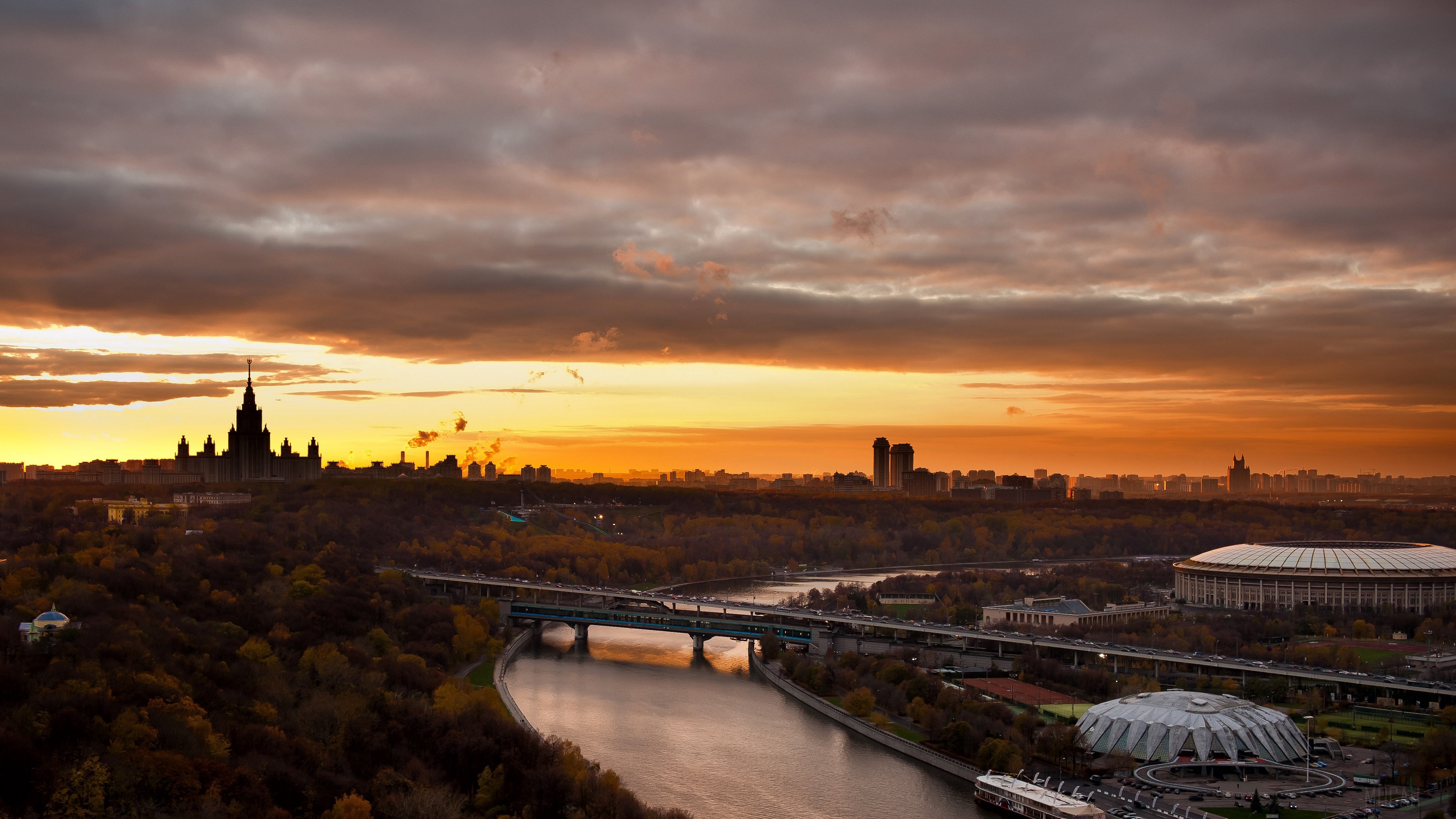 Moscow cityscape with river and stadium at sunset HD Wallpaper
