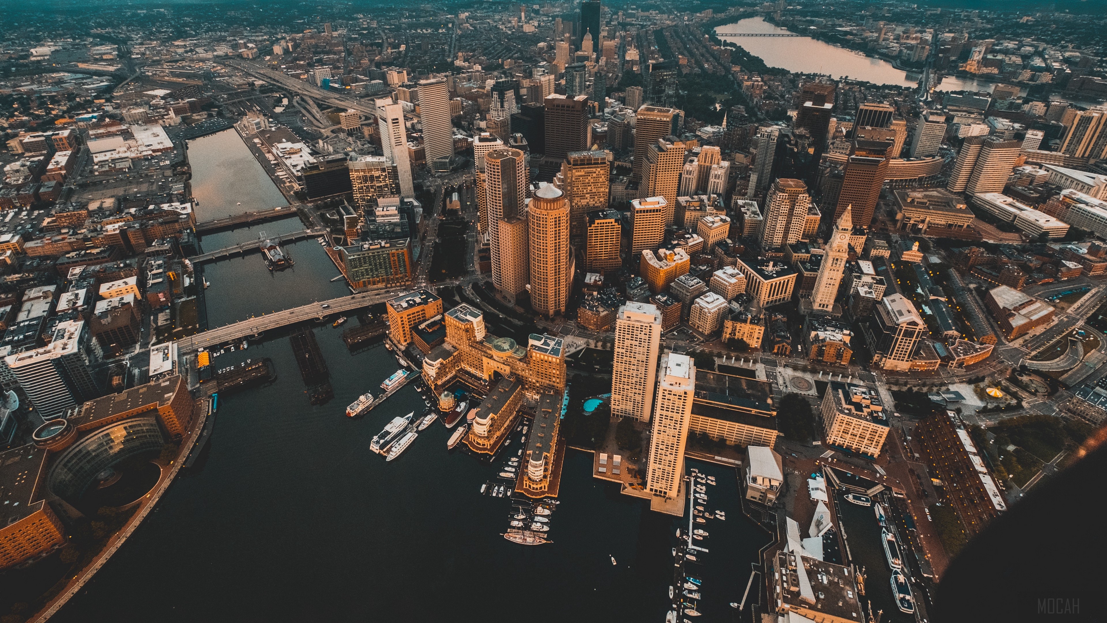 Aerial view of Boston cityscape with river and buildings 4K HD Wallpaper