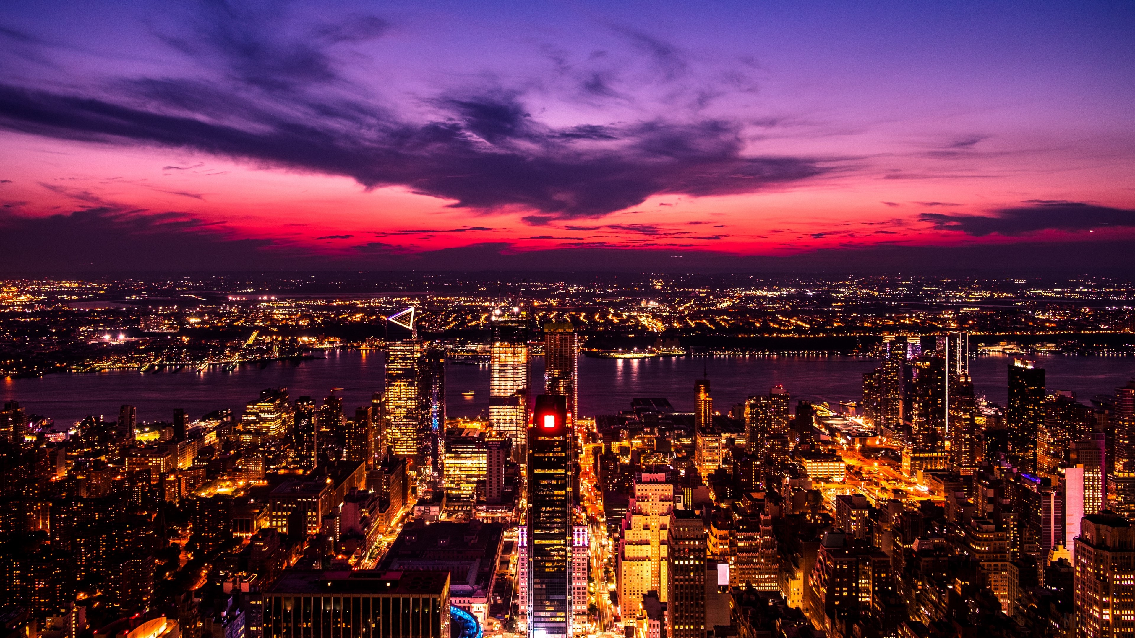 Night city skyline with purple and pink sunset HD Wallpaper