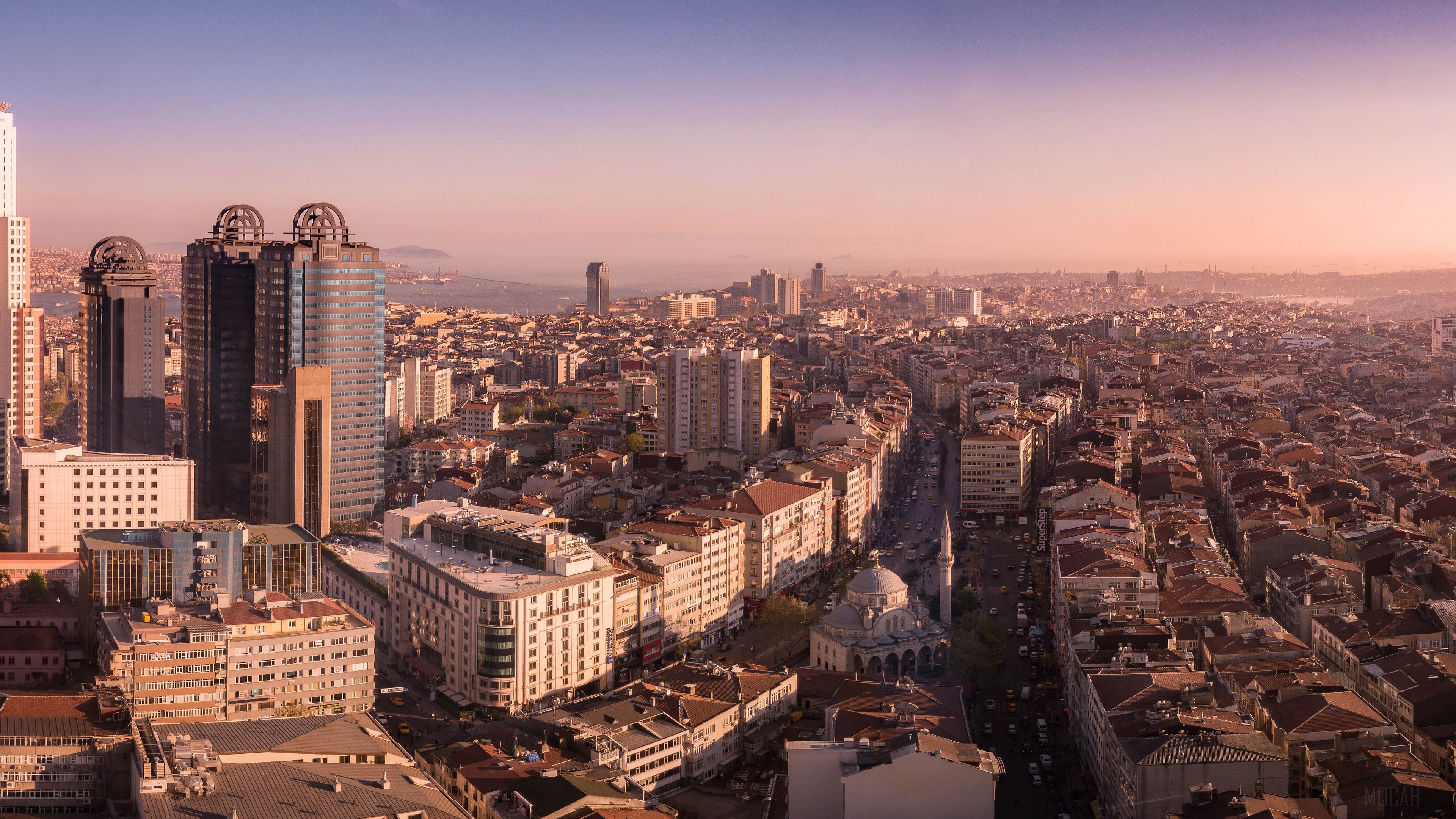 Istanbul cityscape with modern skyscrapers and traditional buildings HD Wallpaper