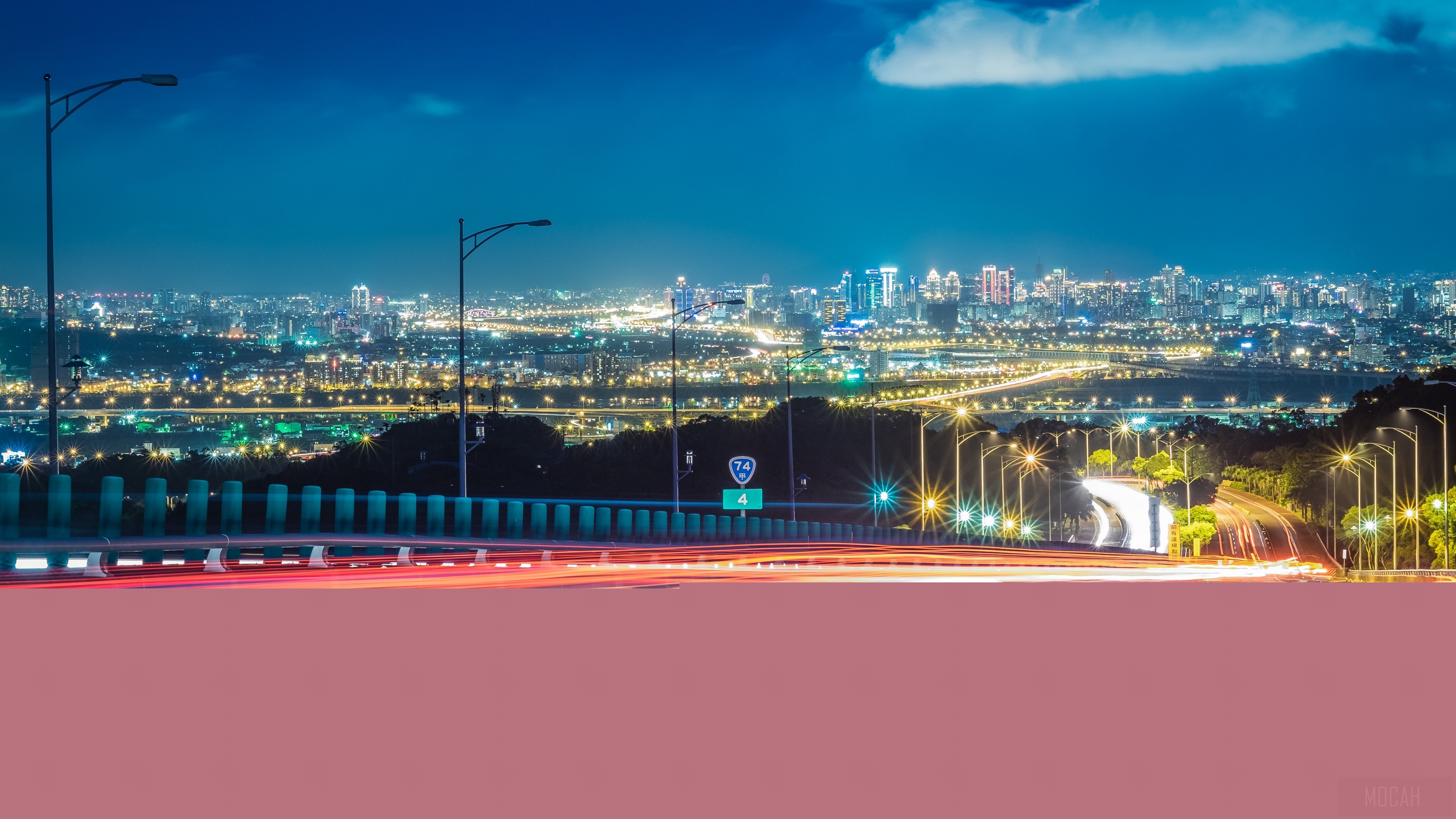 City lights at night with road and highway HD Wallpaper