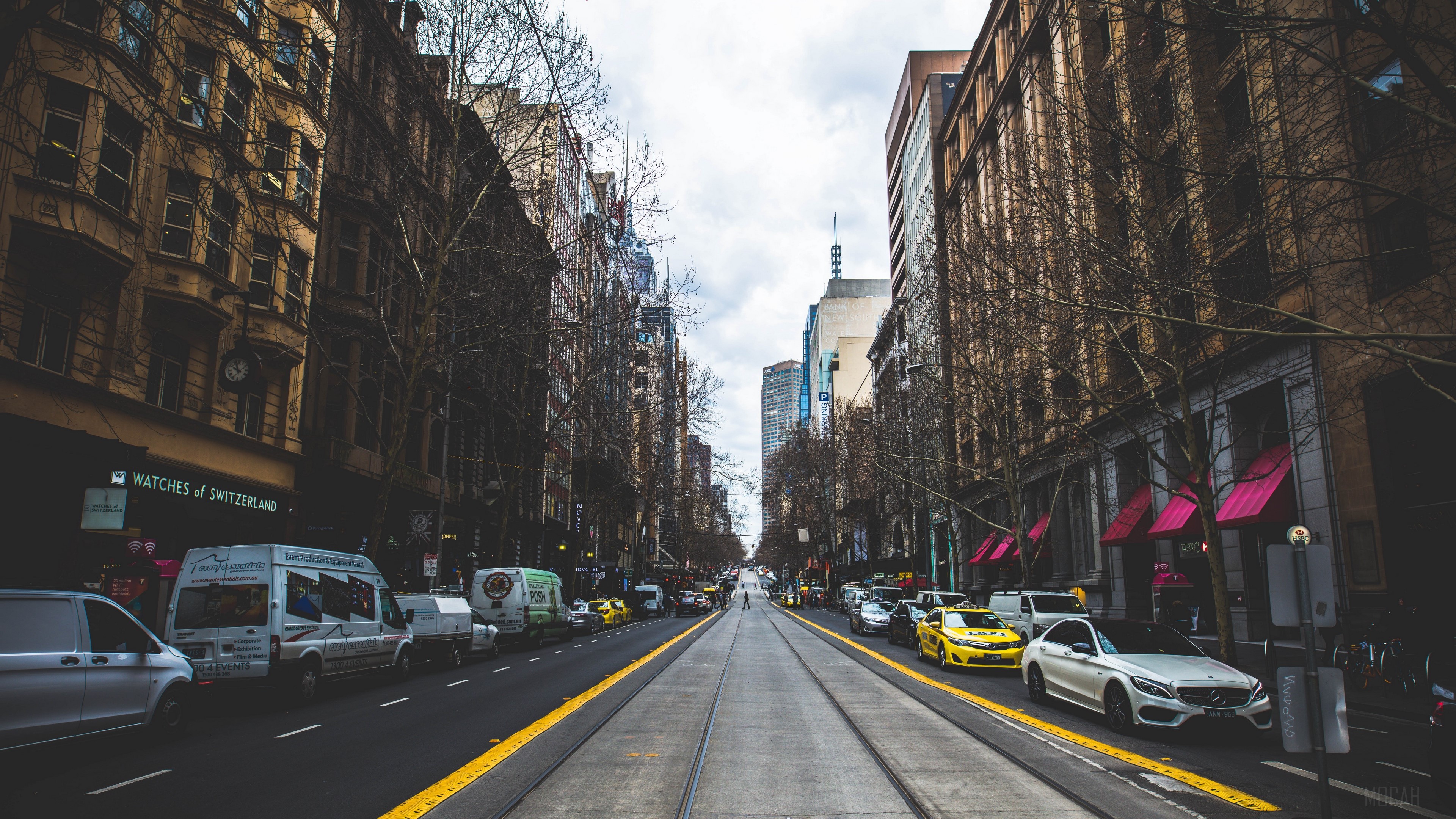 City street with cars and buildings 4K HD Wallpaper