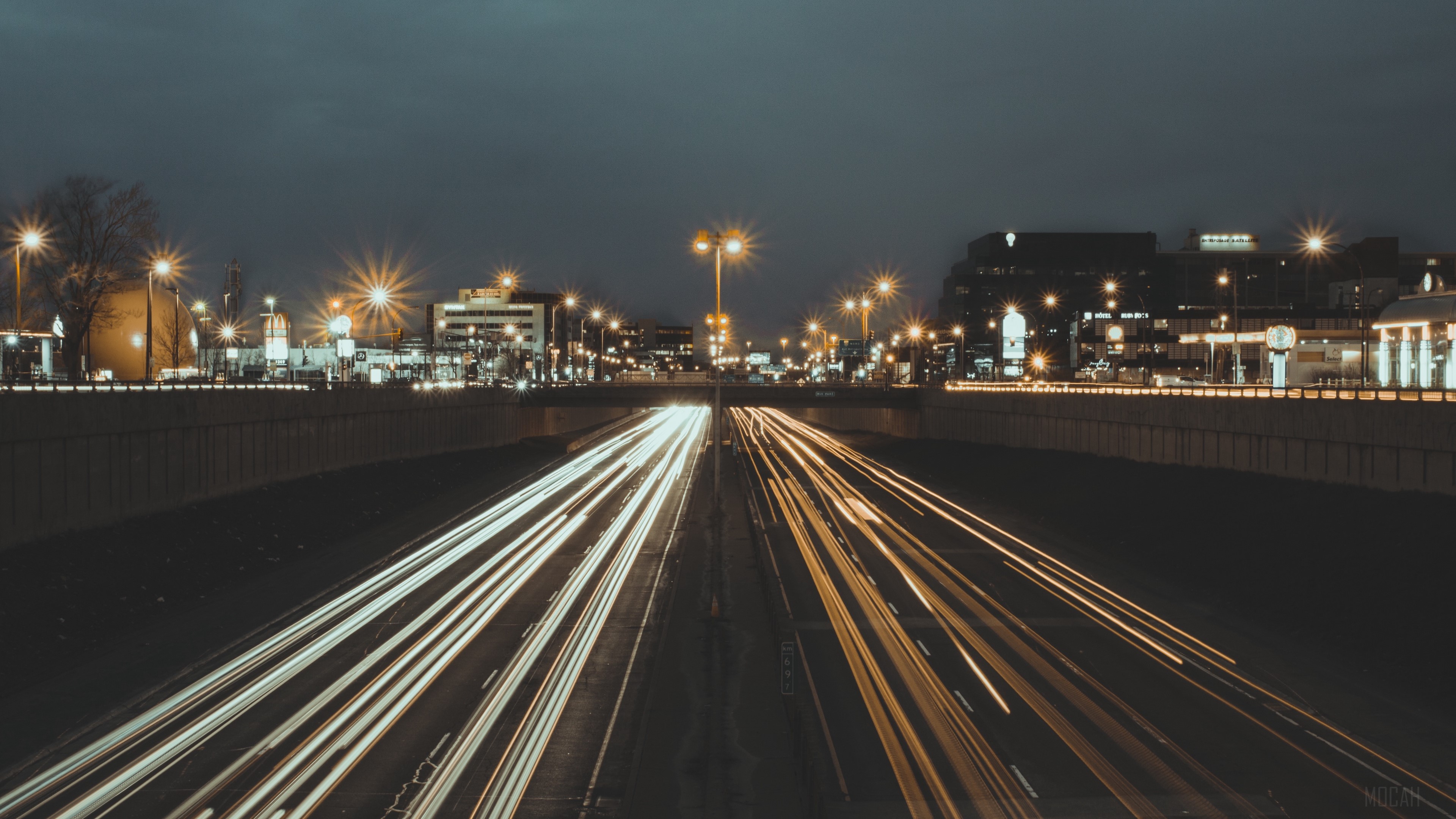City highway at night with light trails 4K HD Wallpaper