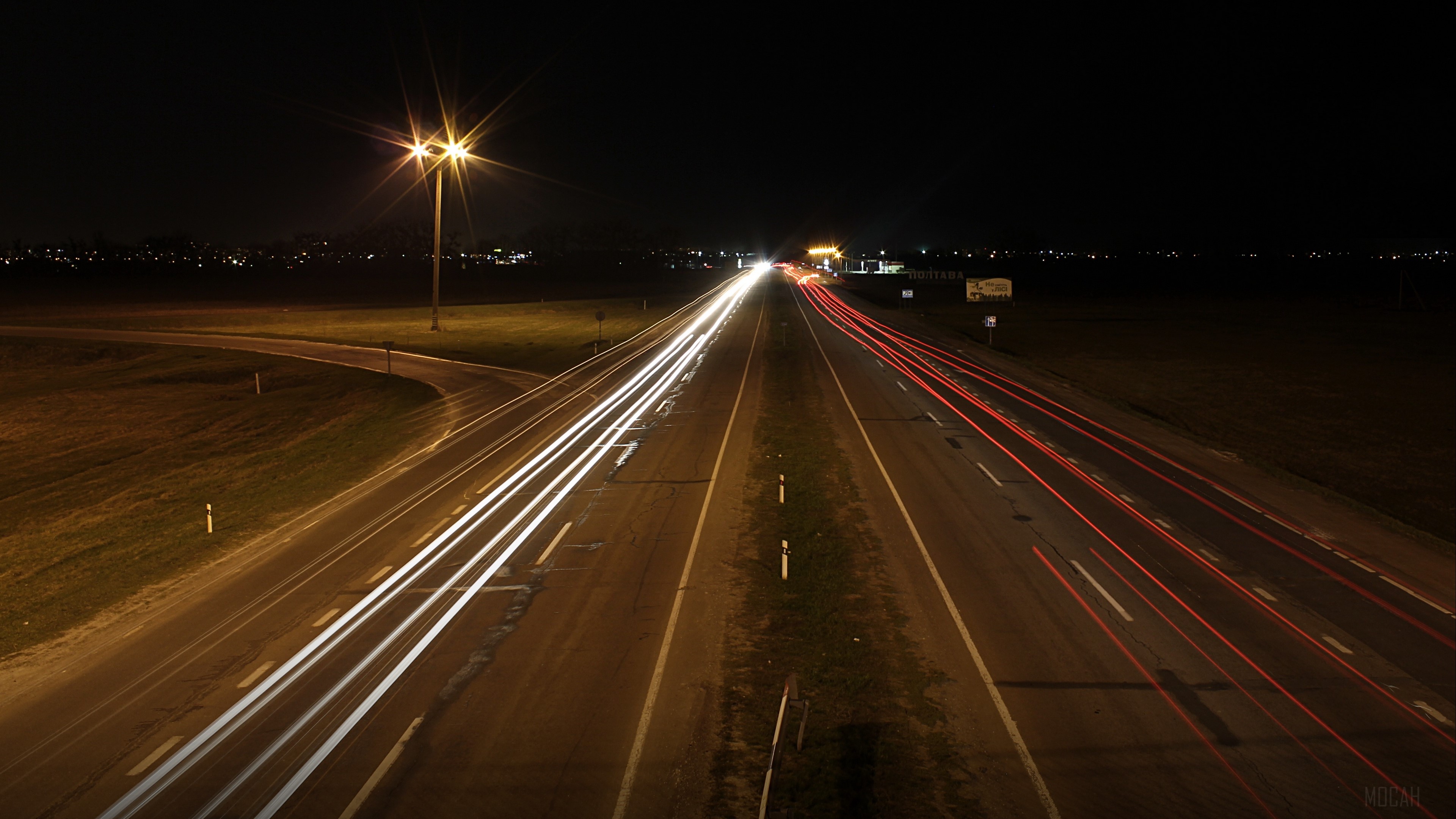 Poltava road at night with light trails 4K HD Wallpaper