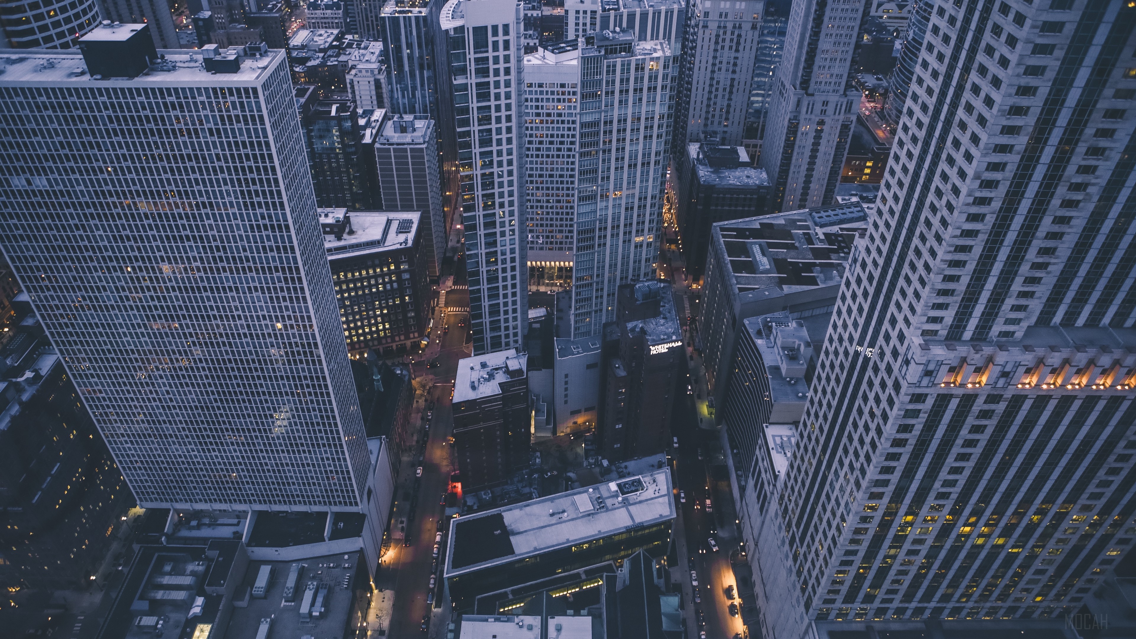 Aerial view of city skyscrapers at dusk HD Wallpaper