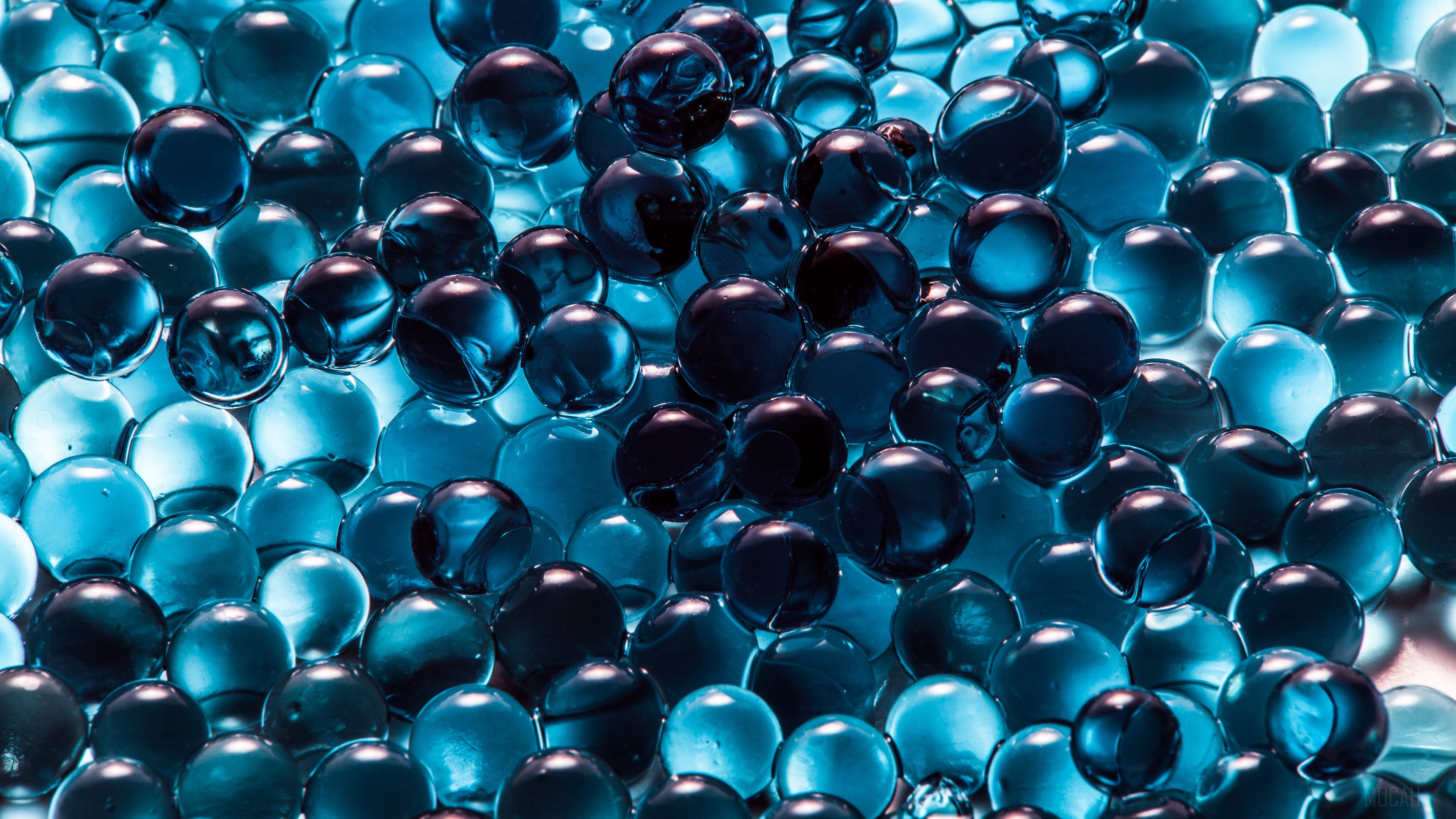 Blue and dark spheres in a pile HD Wallpaper