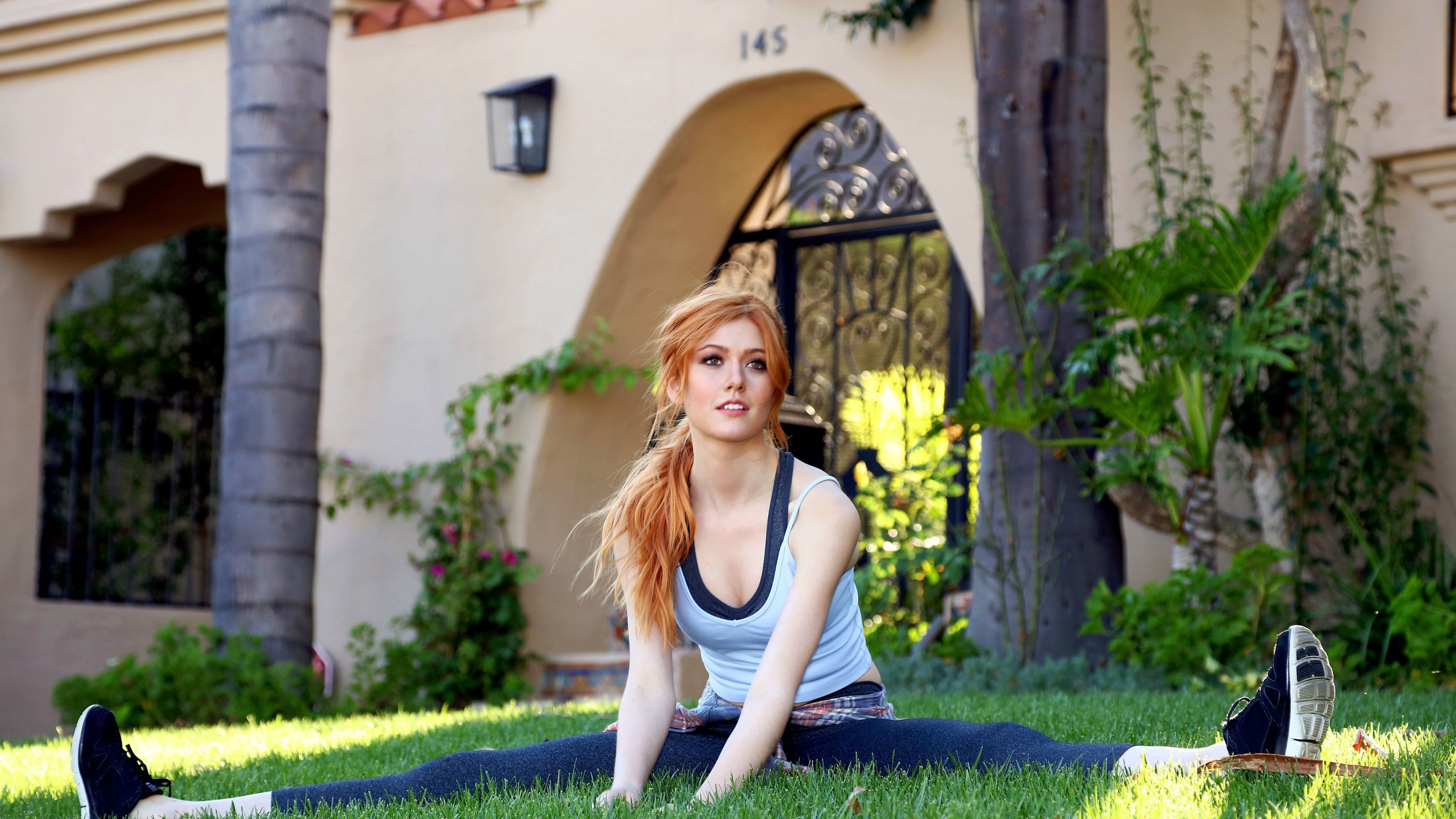 Katherine McNamara doing splits on grass HD Wallpaper