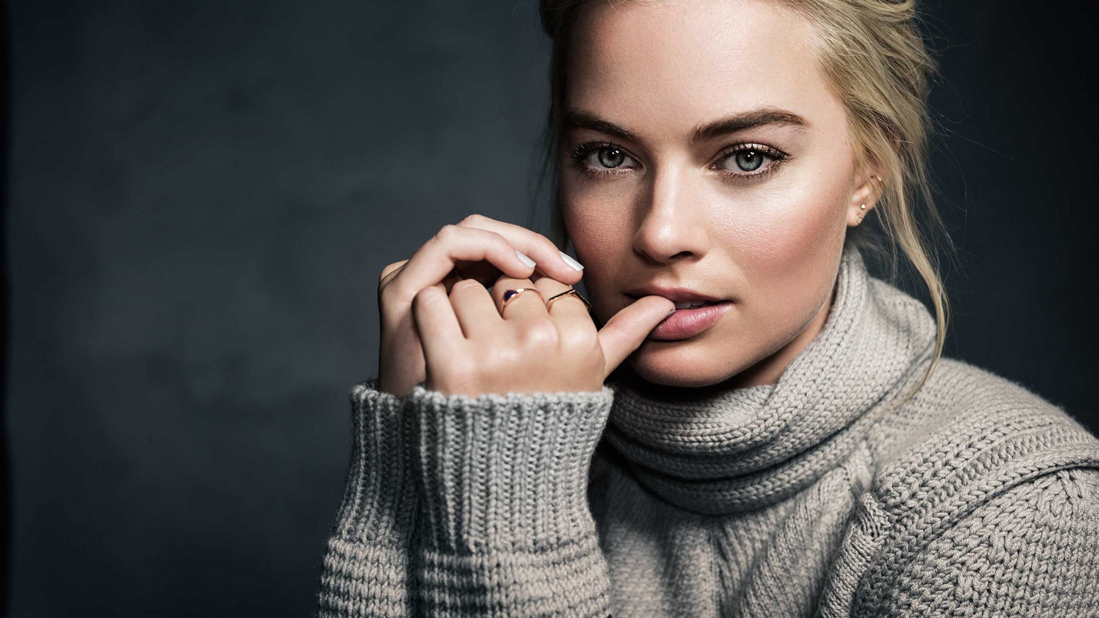 Margot Robbie in a grey turtleneck 4K HD Wallpaper