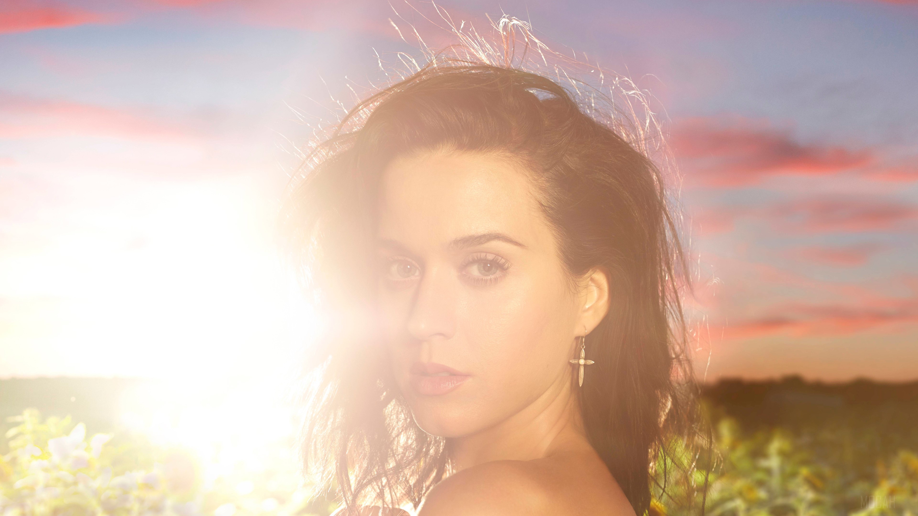 Katy Perry in field at sunset 4K HD Wallpaper