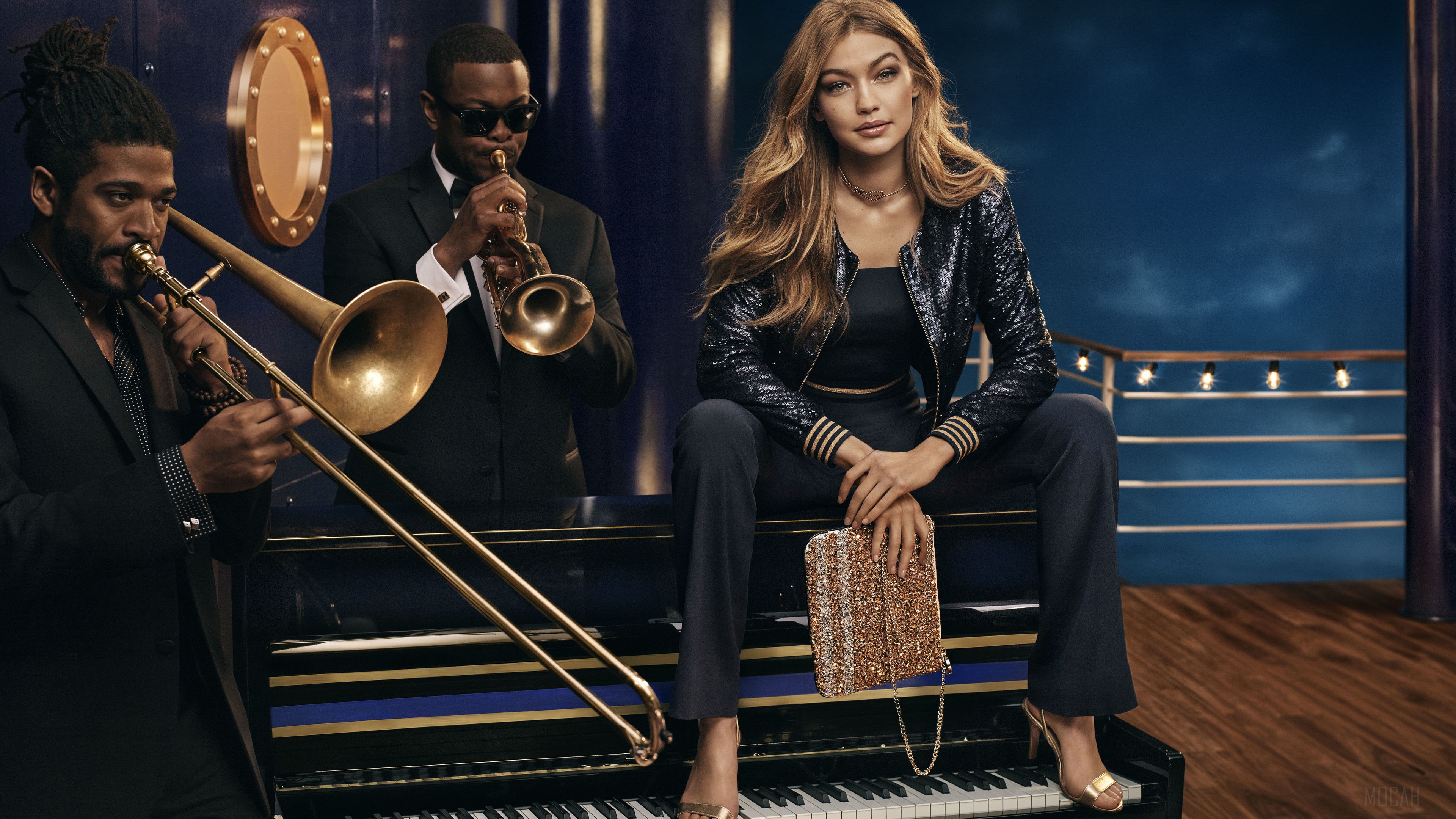 Gigi Hadid with musicians on a piano HD Wallpaper